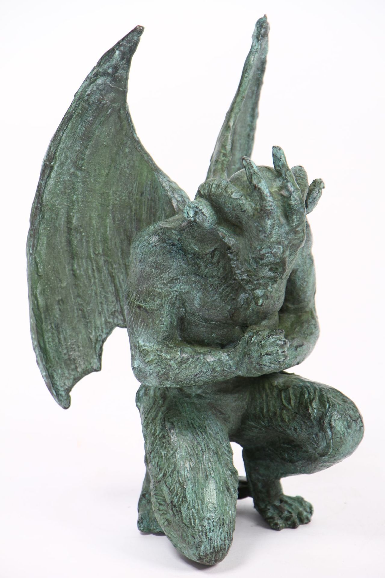 Praying Satan, bronze, green and dark green patinated, in humble posture, detailed molding, heavy