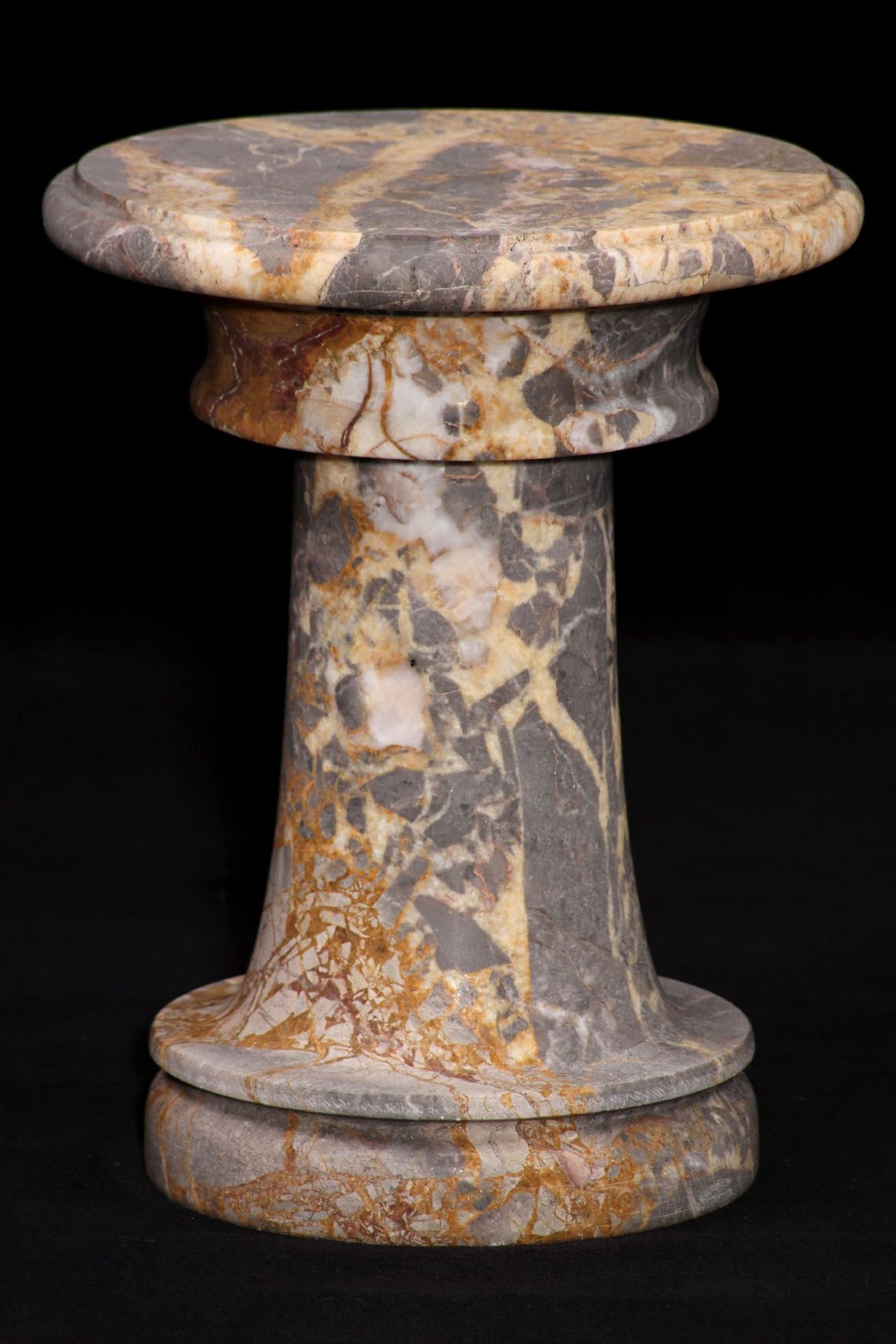 Marble column, grey, yellowish and white marble, vividly veined, hewn from the block, partly with