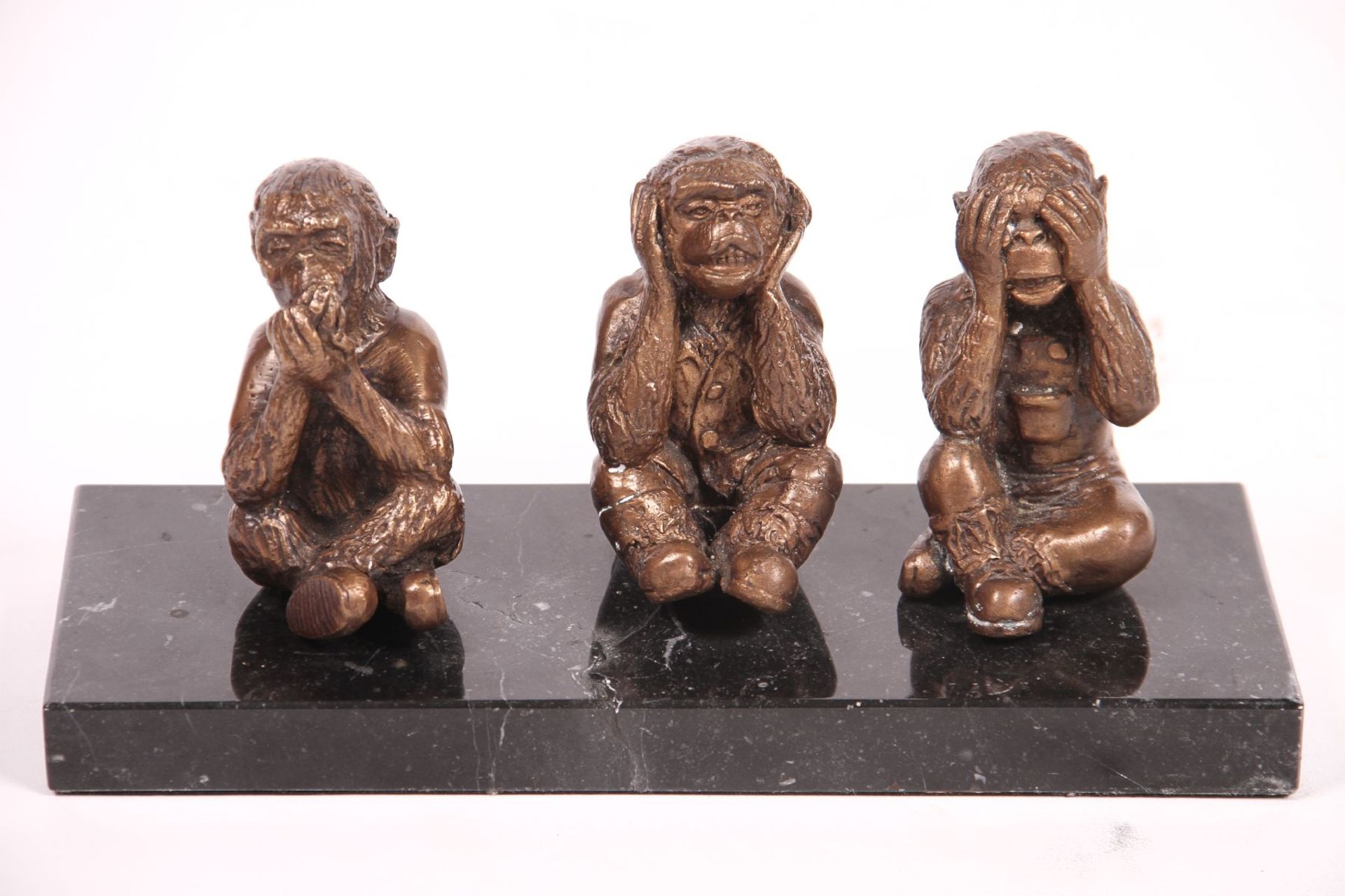 3 monkeys, "Do not hear, do not see, do not speak", bronze, patinated golden brown, on black