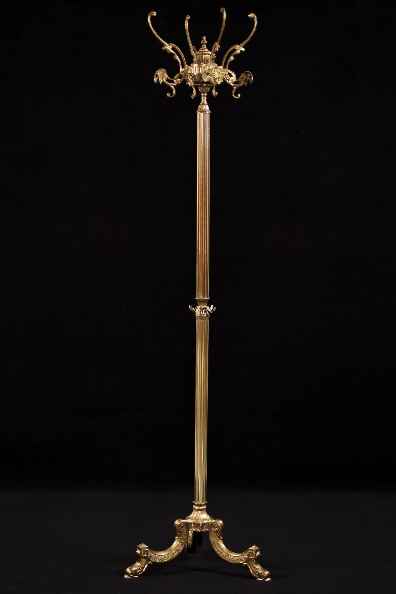 Coat Rack, metal, partly gold, foot with curved arms, turnable top, traces of use, approx. hight 175