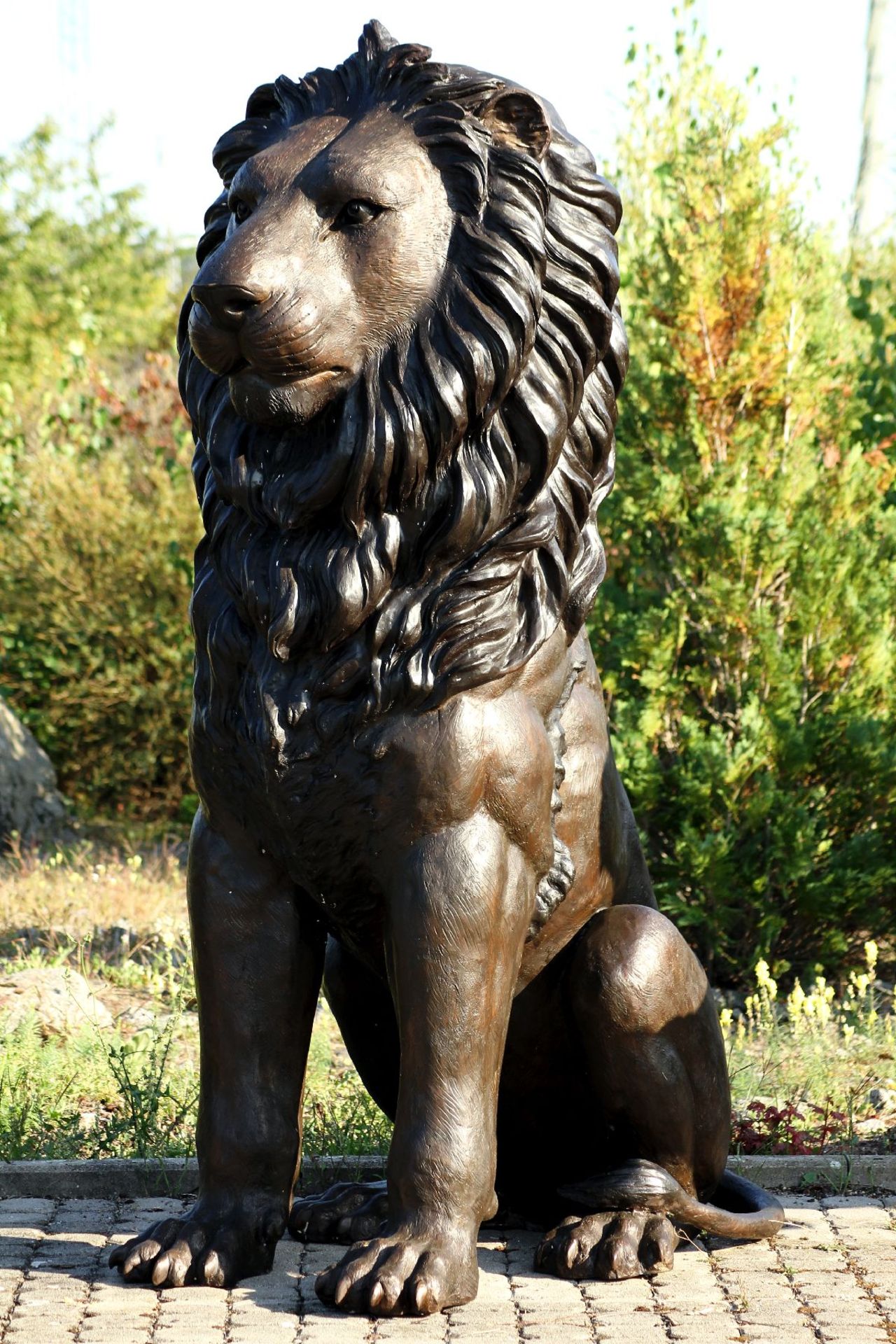 Monumental Lion, bronze, brown patinated, aligned frontally, tail to the left, majestic charisma,
