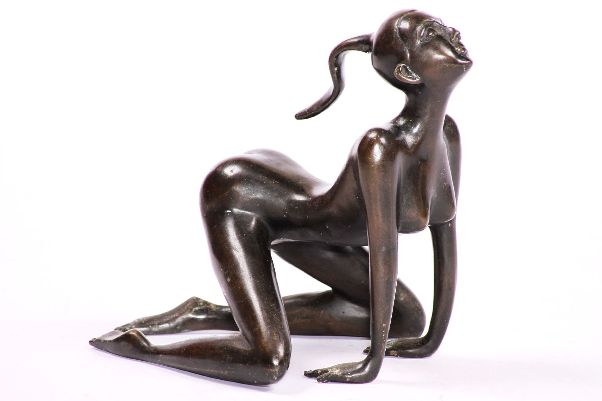 Female nude, bronze, patinated in brown and anthracite, kneeing, camp lock, traces of storage,