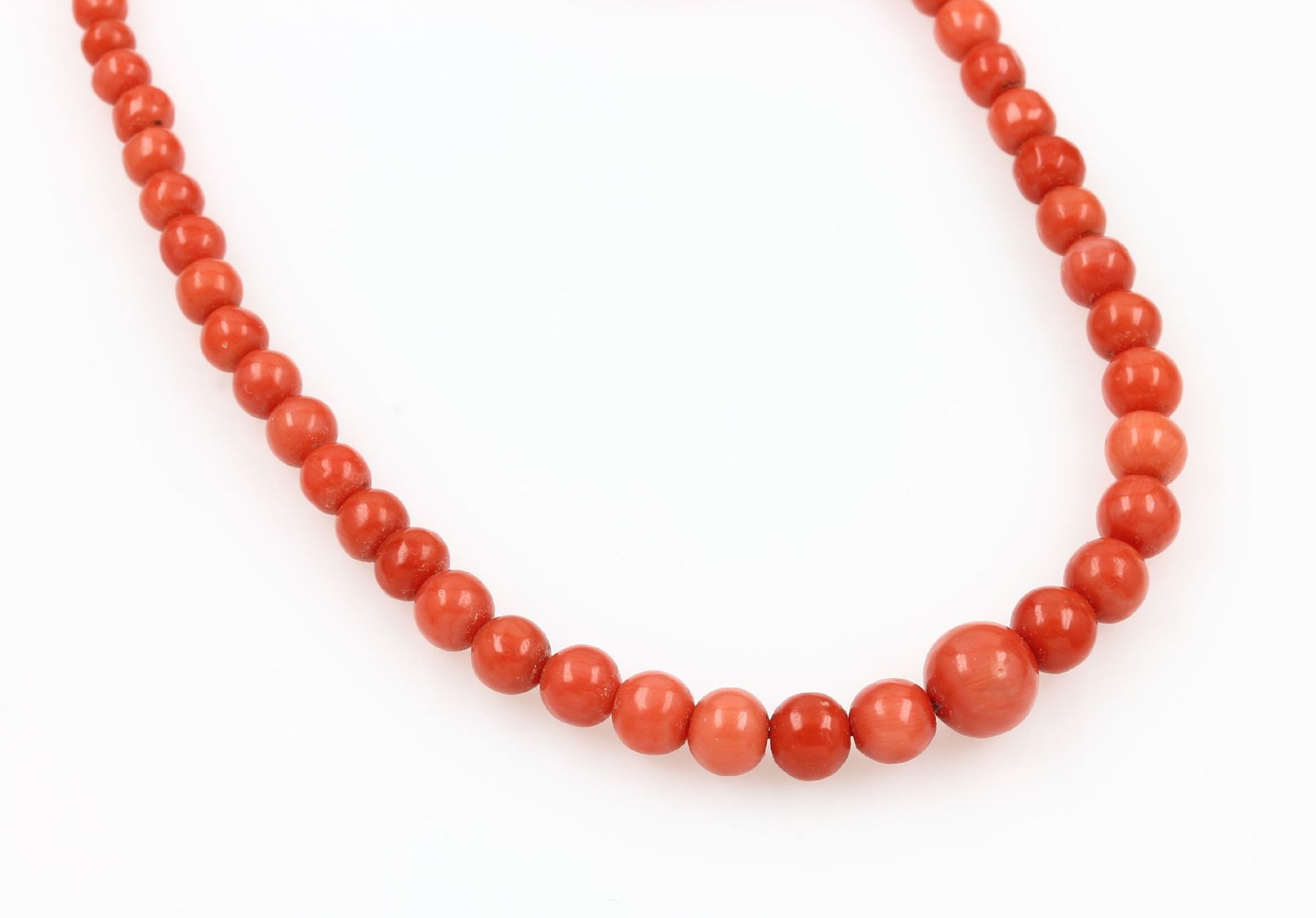 Necklace made of coral, Italy approx. 1890s , coral spheres tapering, diam. approx. 4.5 - 9.5 mm ,