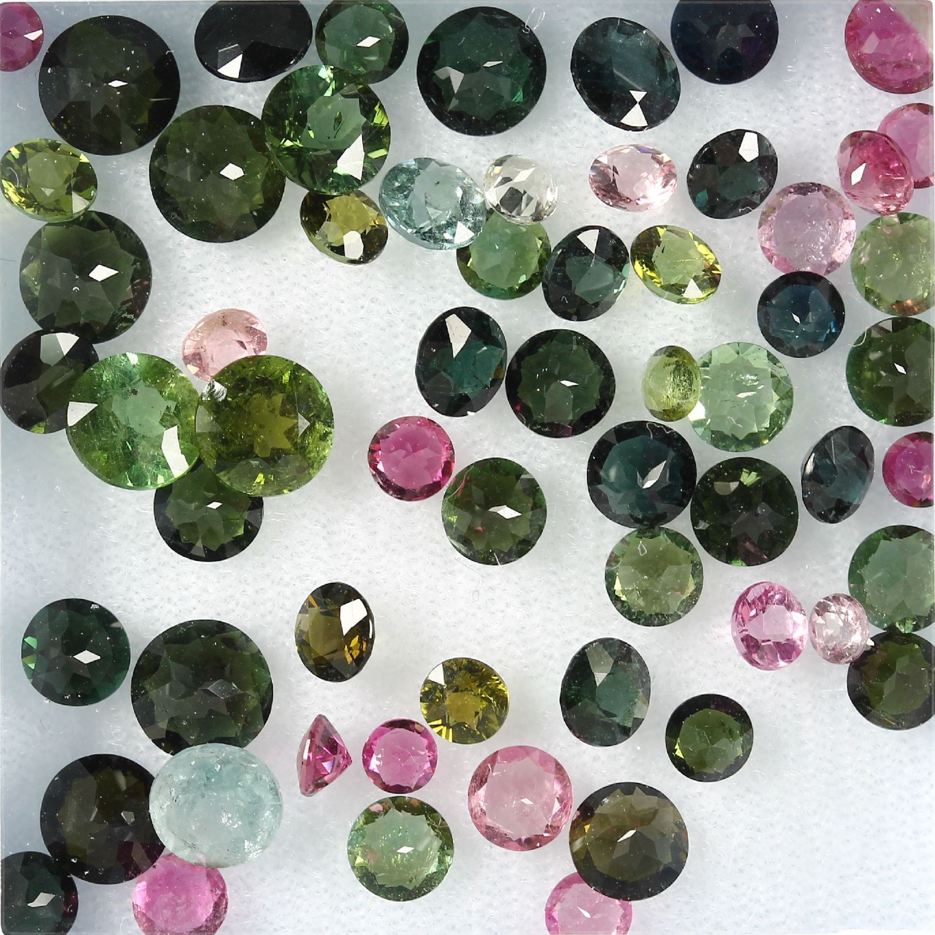 Lot loose bevelled tourmalines , total 27.11ct, round bevelled, in different sizes and colours