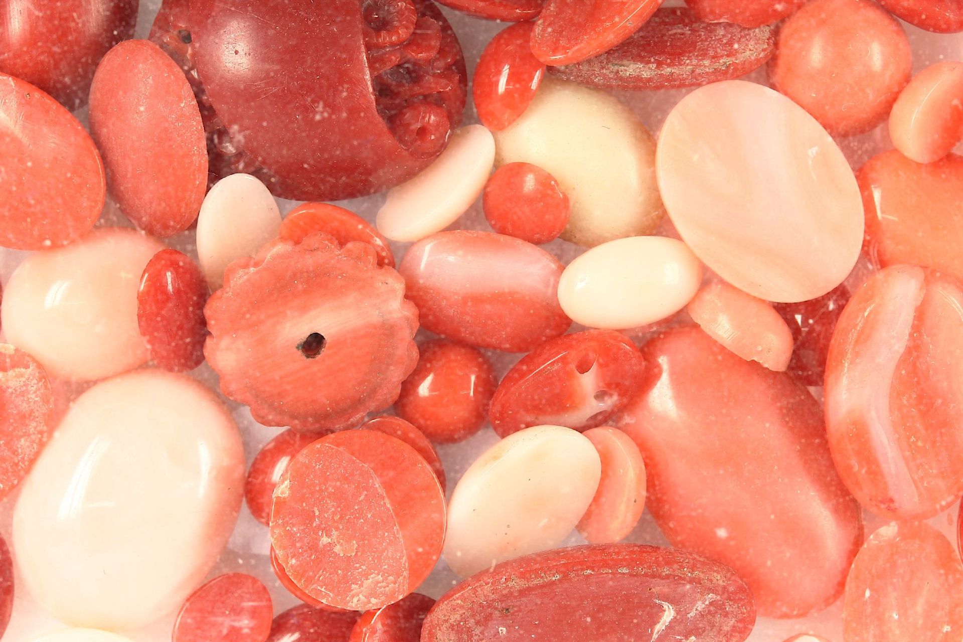 Lot loose coral cabochons total approx. 198 ct , different shapes, stones with traces of mounting,