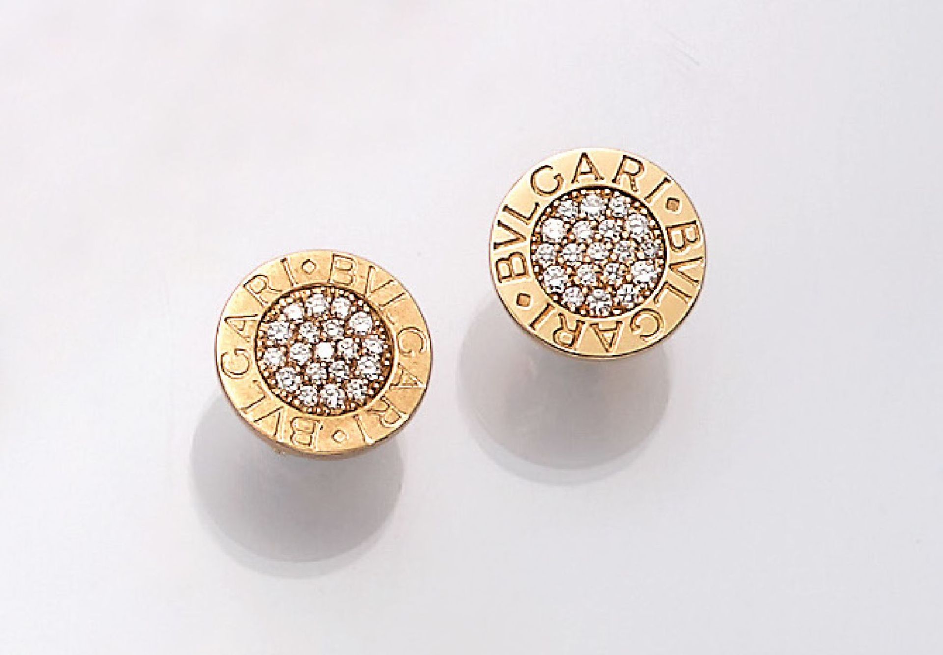 Pair of 18 kt gold BULGARI earrings , YG 750/000, earrings with brilliants, total approx. 0.6 ct Top