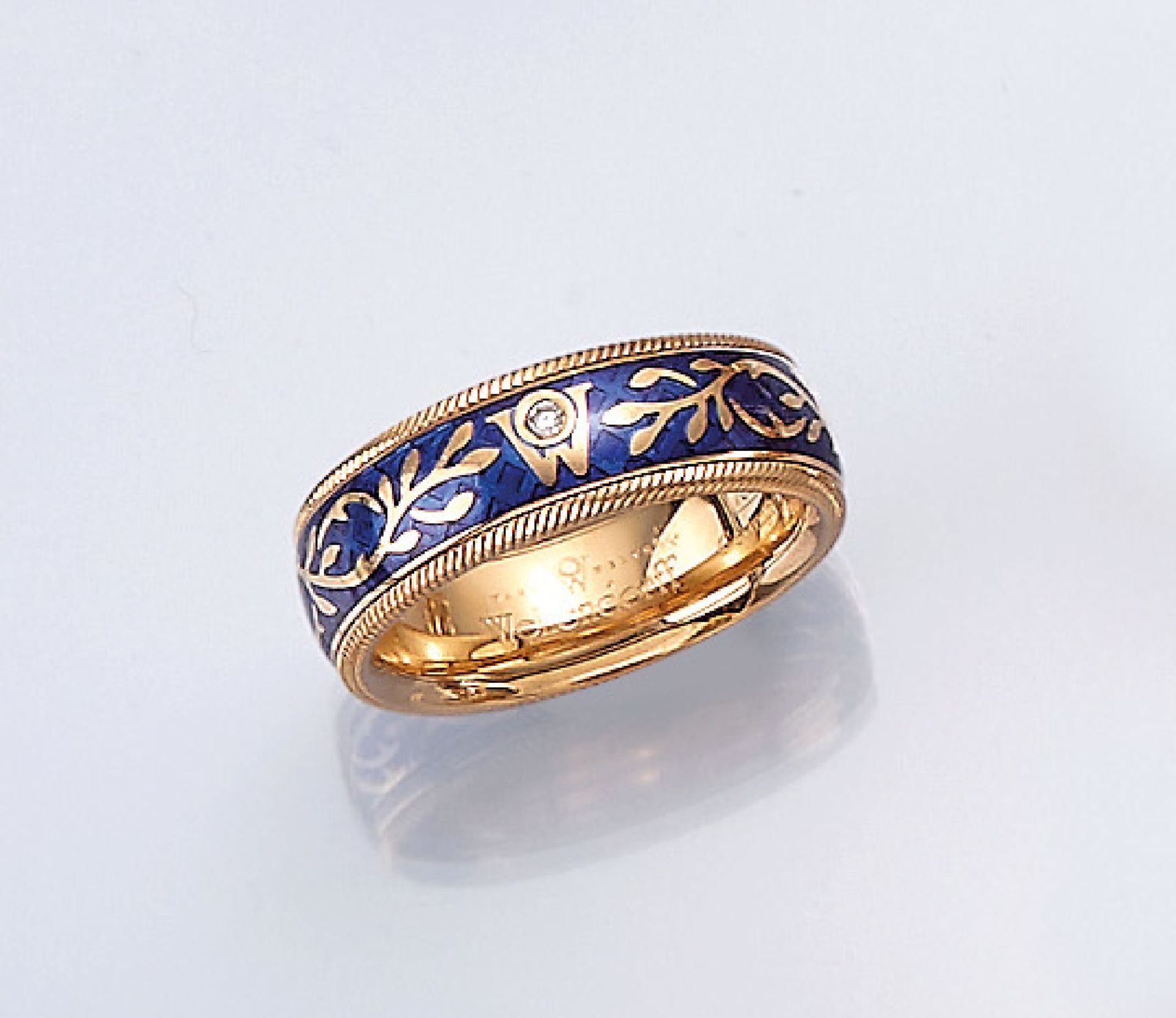 18 kt gold WELLENDORFF ring "forget-me-not" , YG 750/000, translucent blue enameled, cord band