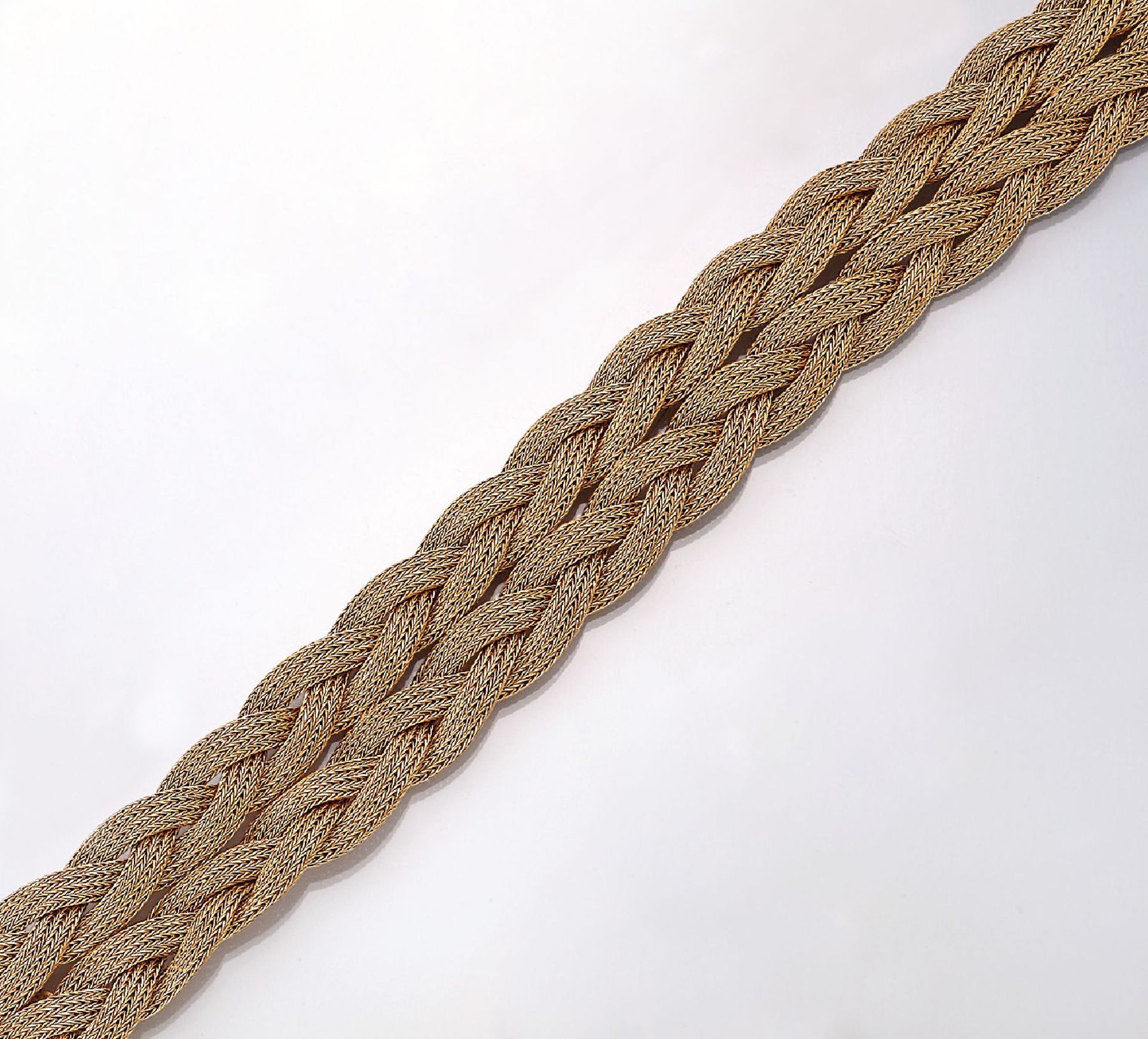 18 kt gold bracelet , approx. 47.6 g, YG 750/000, braided design, l. approx. 21 cm, case lock with 2