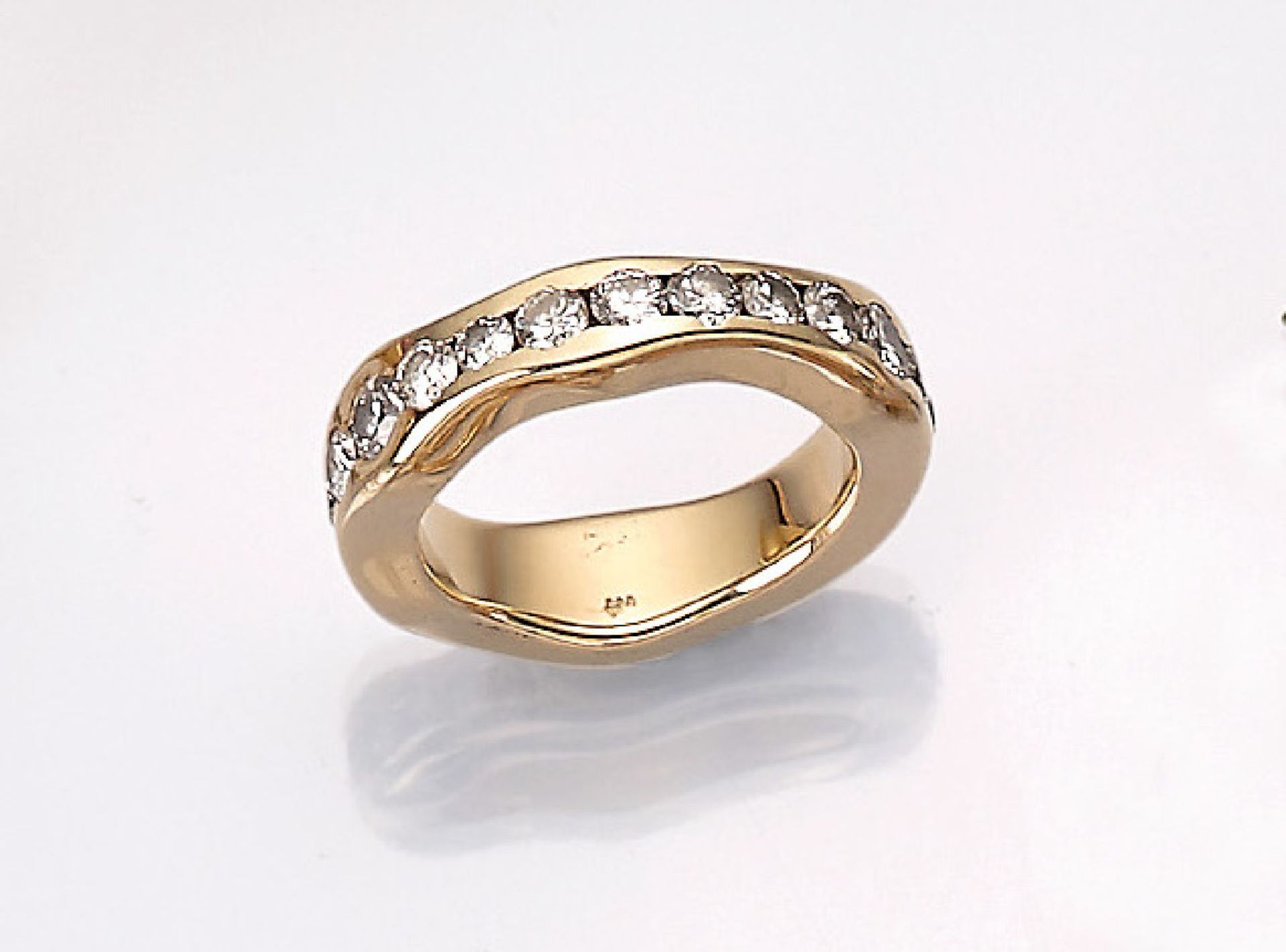 14 kt gold memoryring with brilliants , YG 585/000, unusual design, 24 brilliants total approx. 2.50