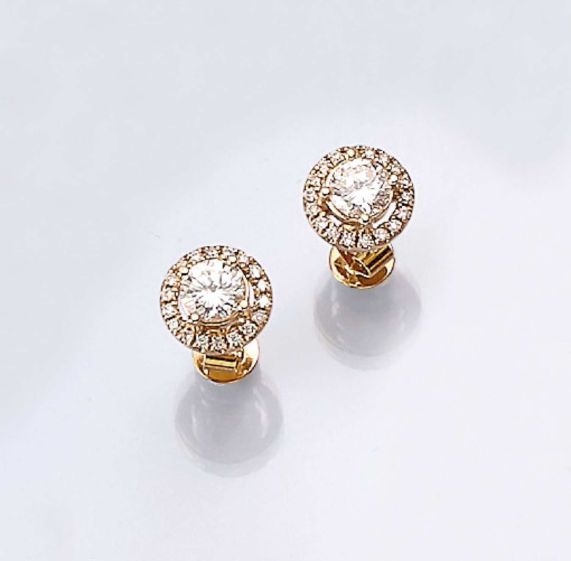 Pair of 18 kt gold earrings with brilliants , YG 750/000, 2 brilliants total approx. 0.81 ct