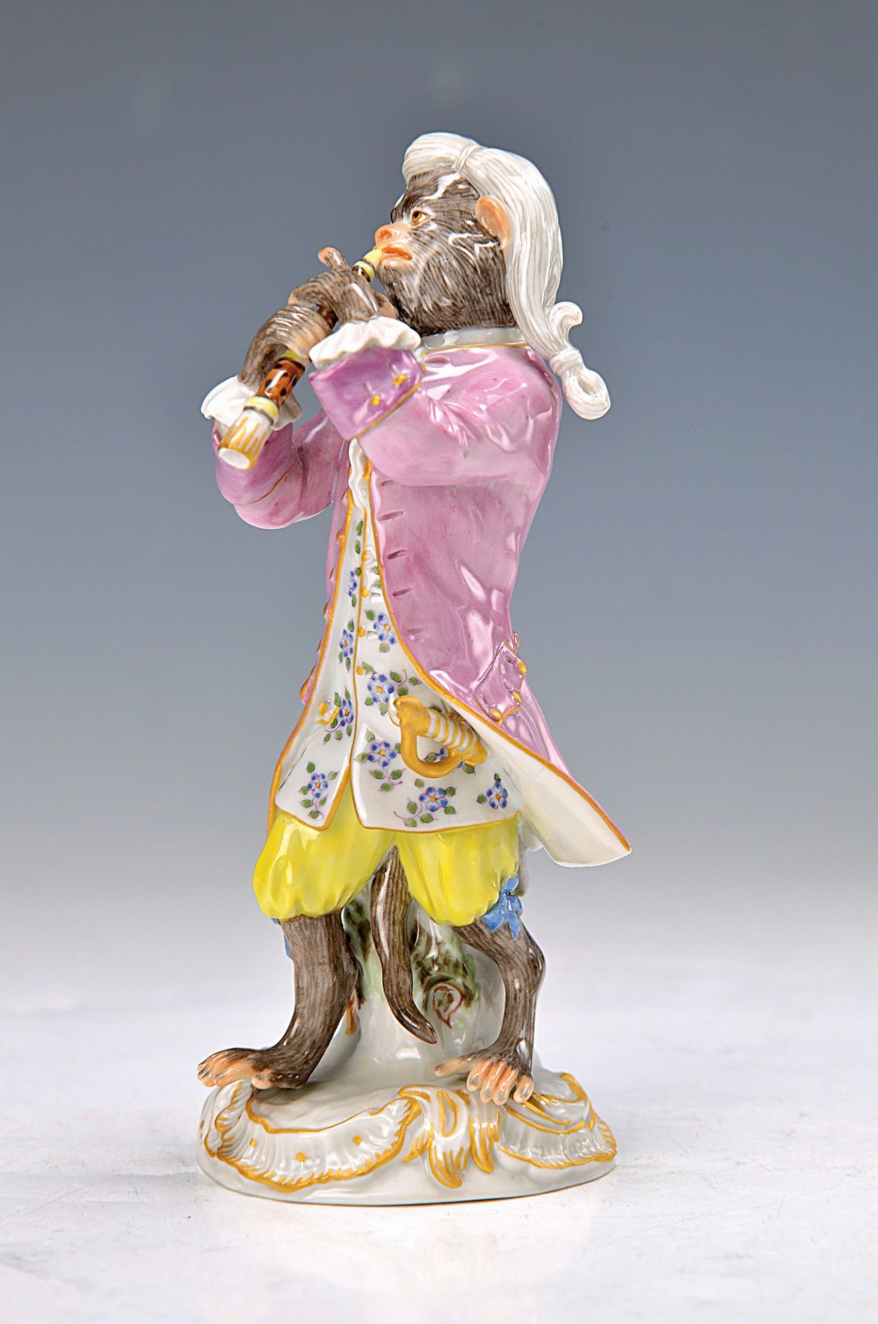 figurine, Meissen, 20th c., flautist of the monkey band after Kändler, painted in bright colors,