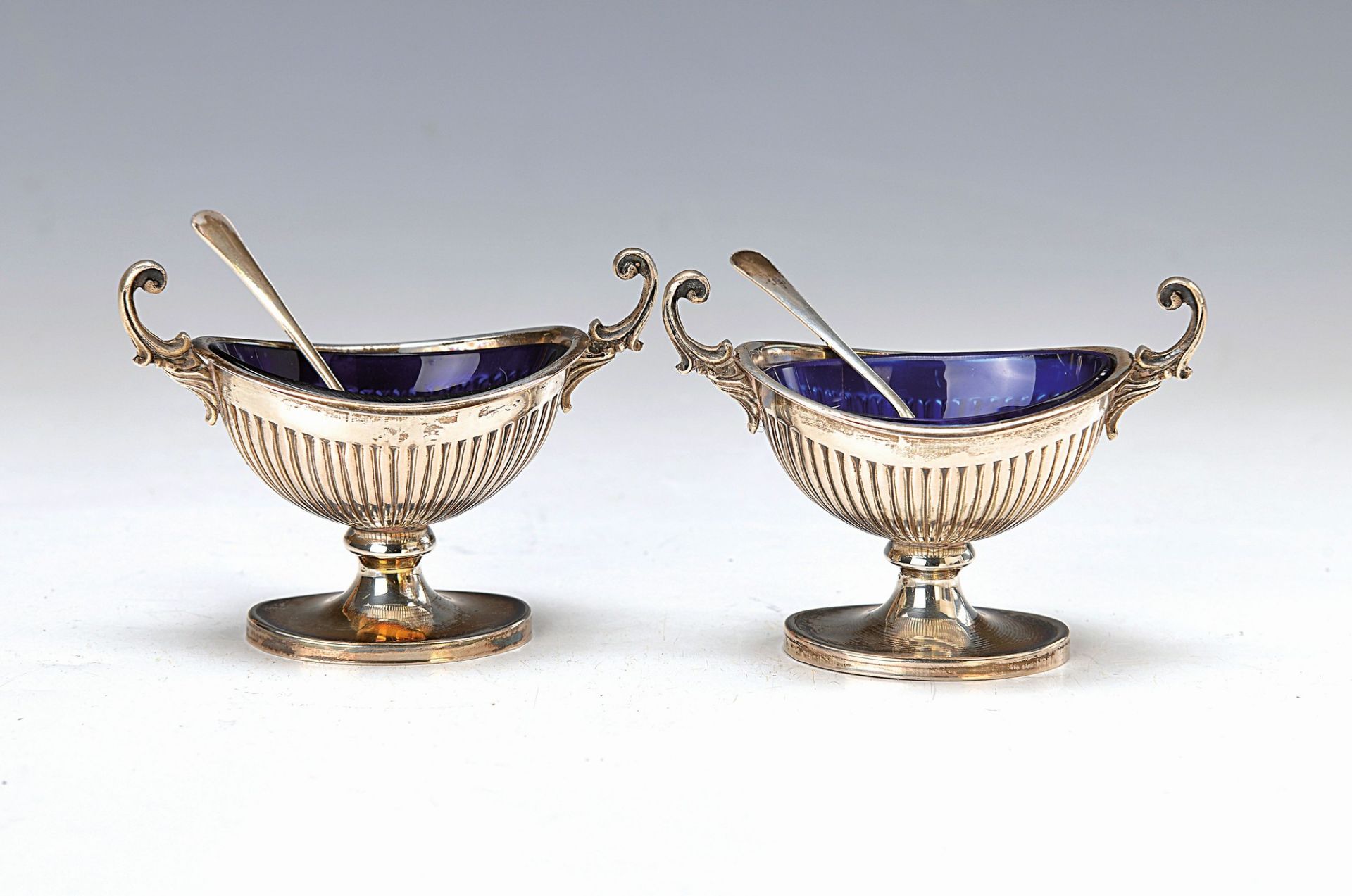 pair of bowls for spices, probably Italy, after English model, 800 silver, blue glass inserts,