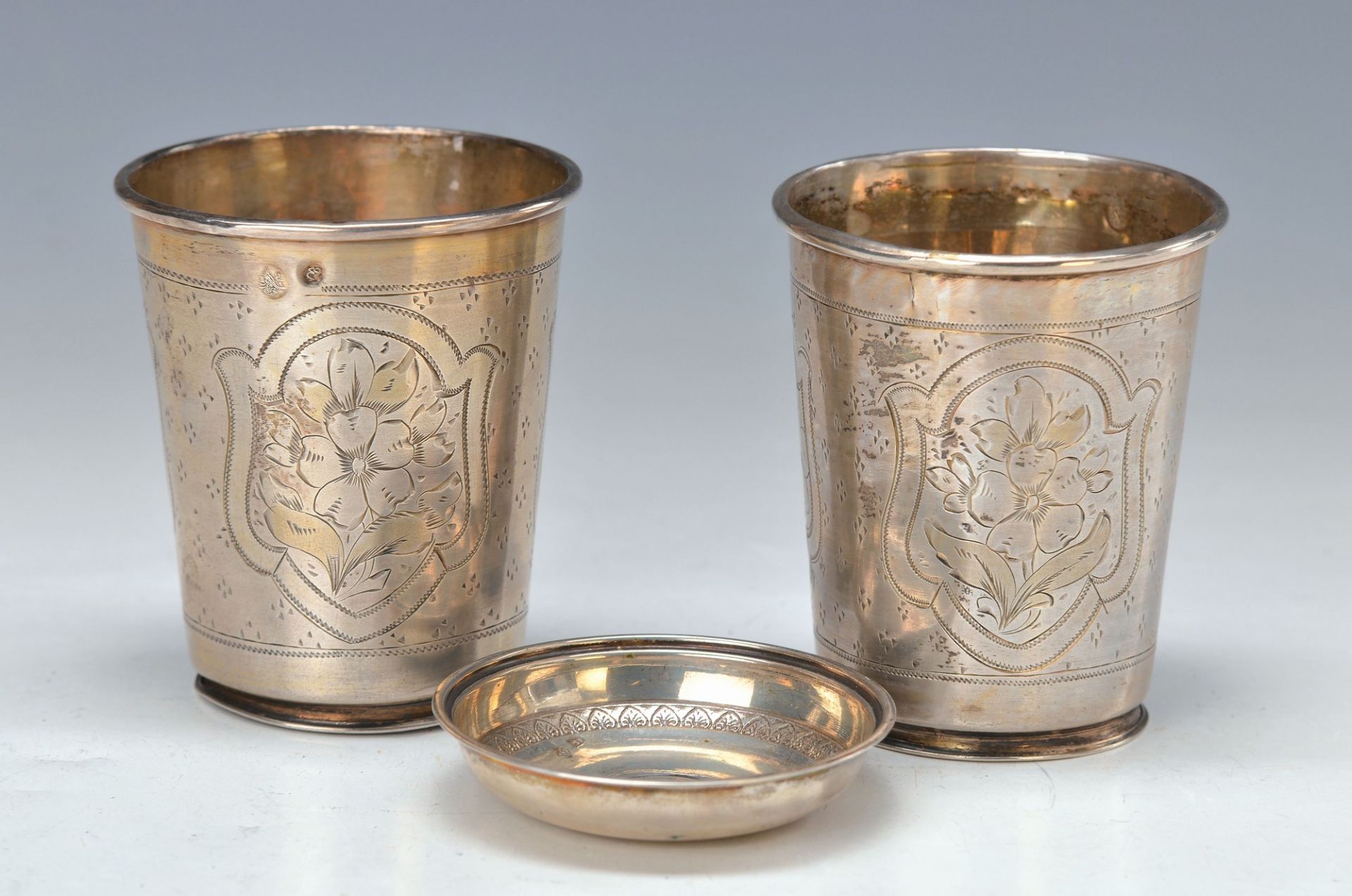 couple of beakers and small bowls, probably Turkey, 19th c., silver driven and enchased, floral