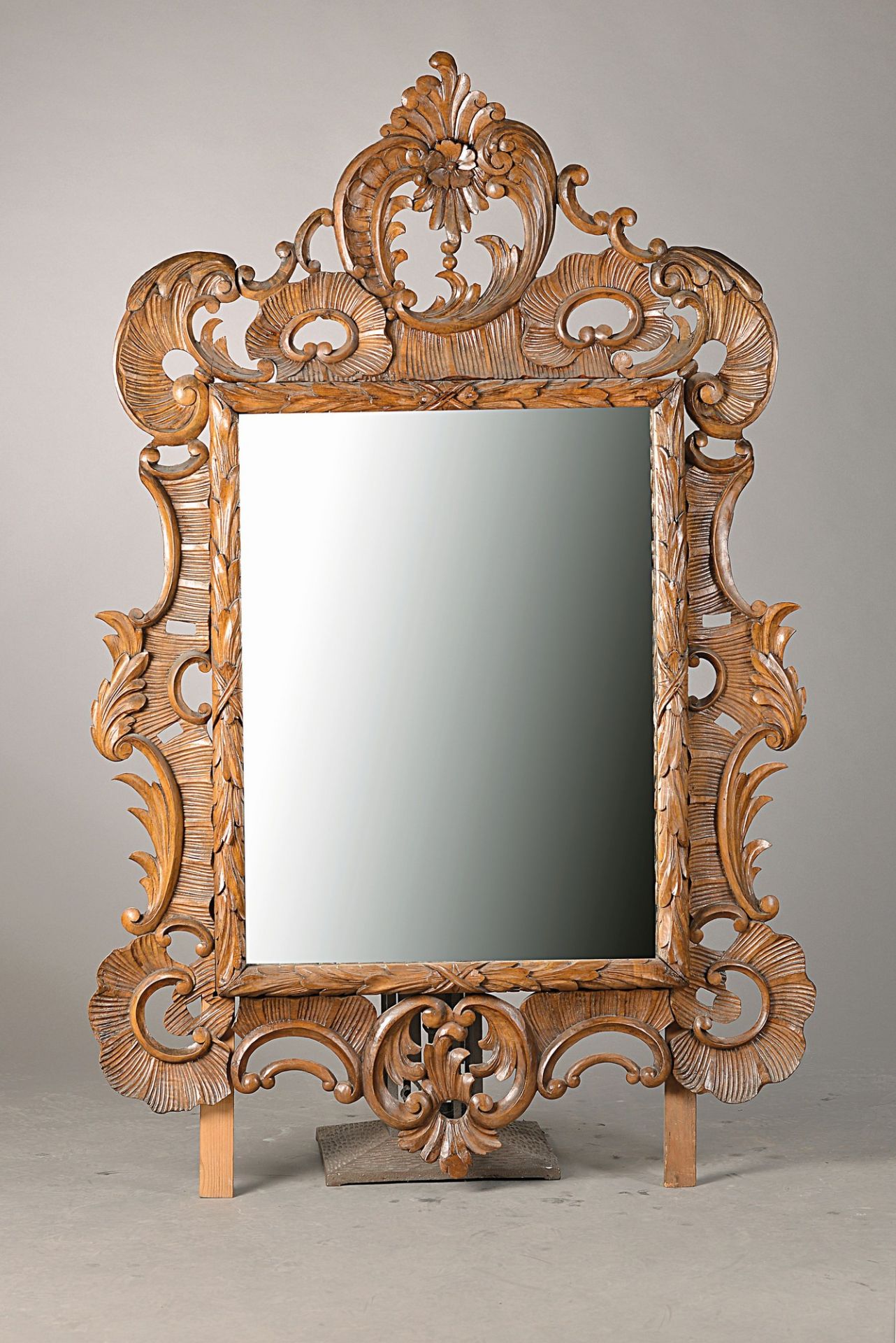 Large Wall mirror, Southern Germany, 19th c., walnut opulent carved with clams, rococo decoration