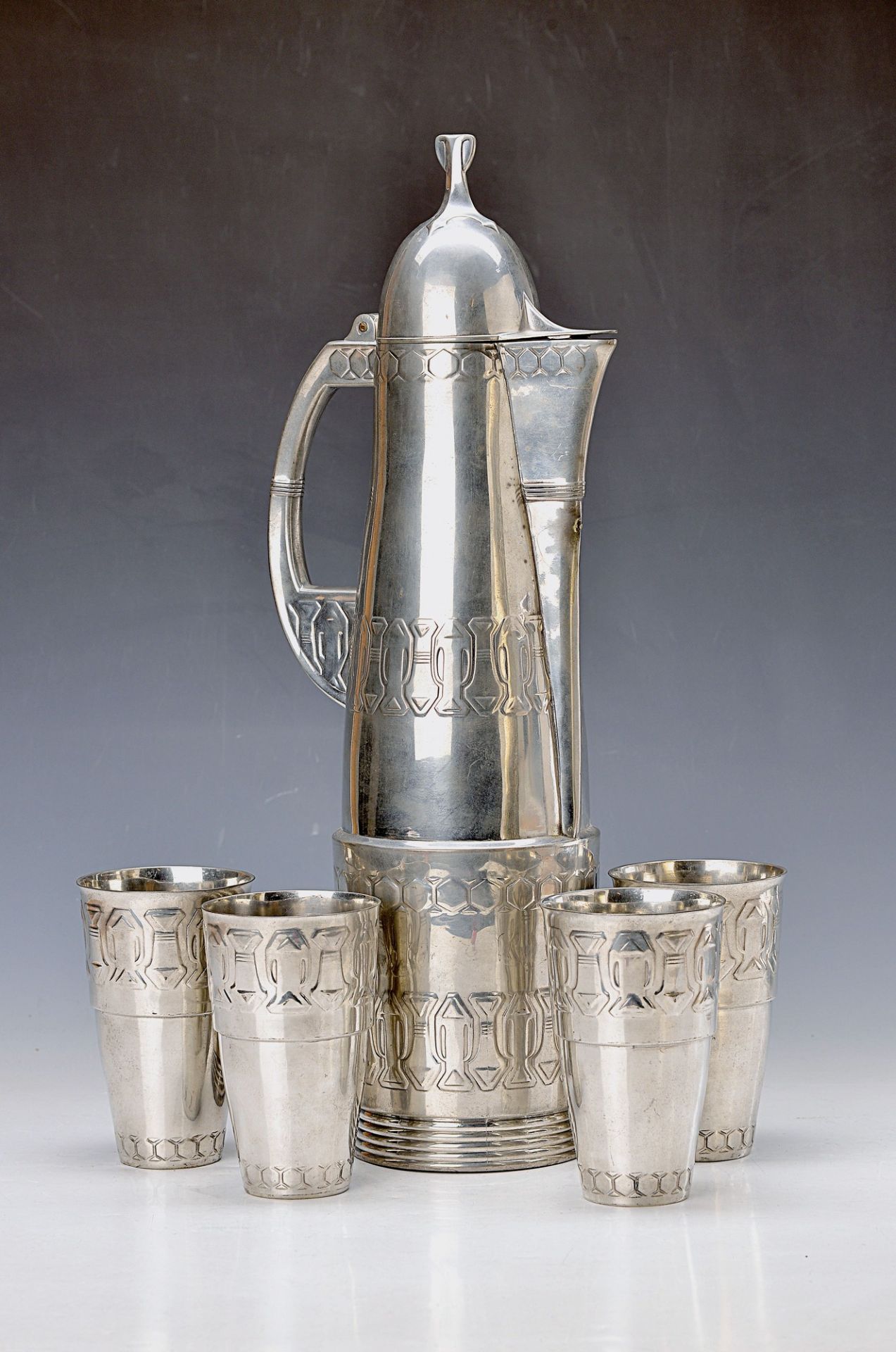 Art Nouveau Set, design by Albert Reimann, tin, abstract geom. decor, large pot and four beakers, H.