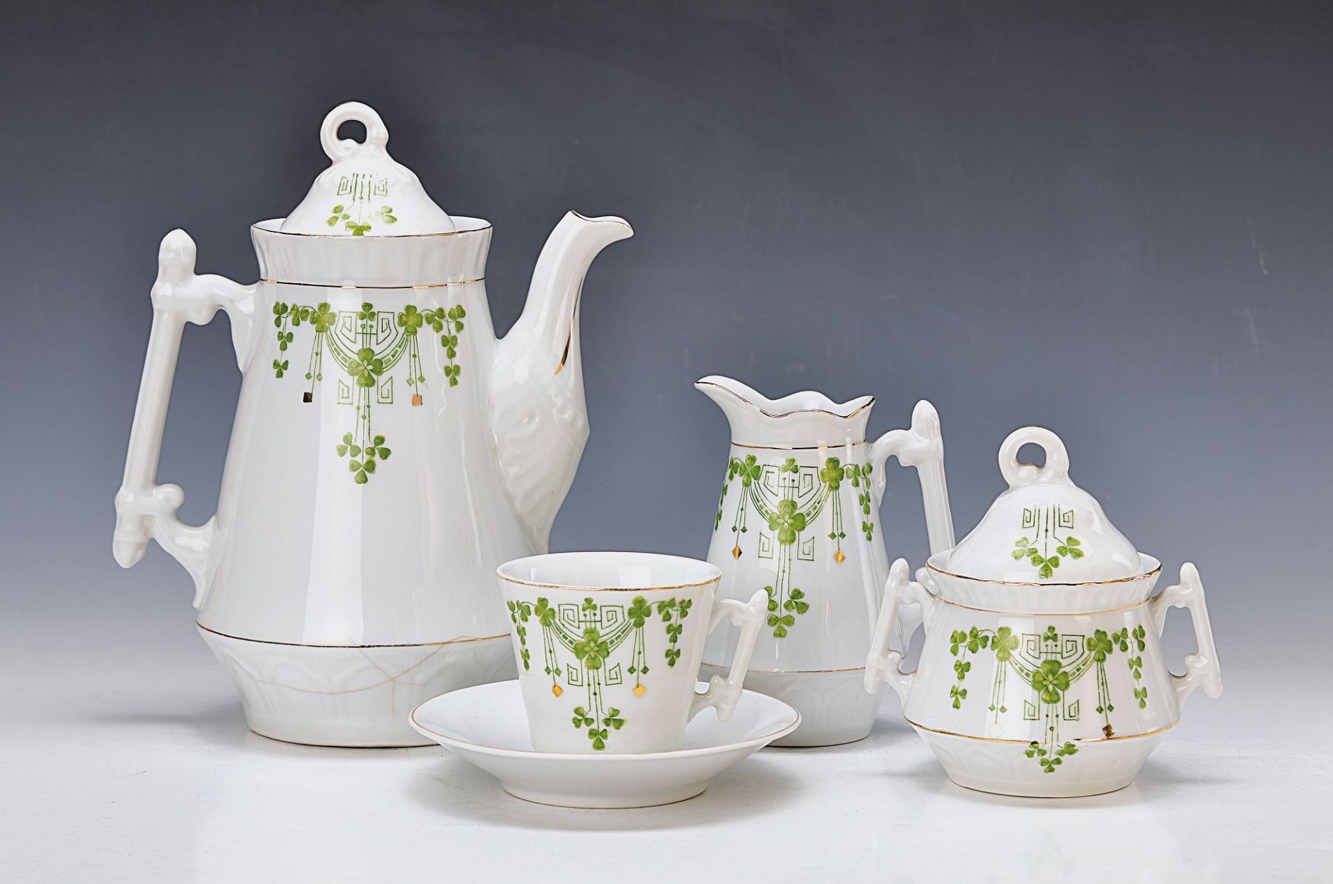 coffee set, German, around 1900, porcelain, green lithographed Art nouveau decoration withshamrocks,