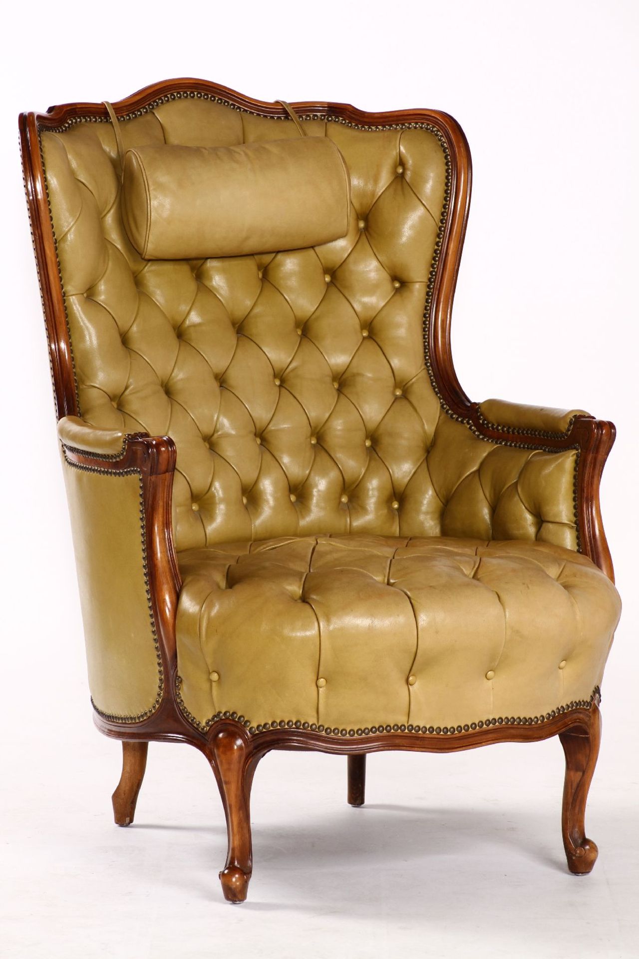 Wingback armchair, after engl. prototype from 1870/80, solid walnut frame, yellow-green or olive