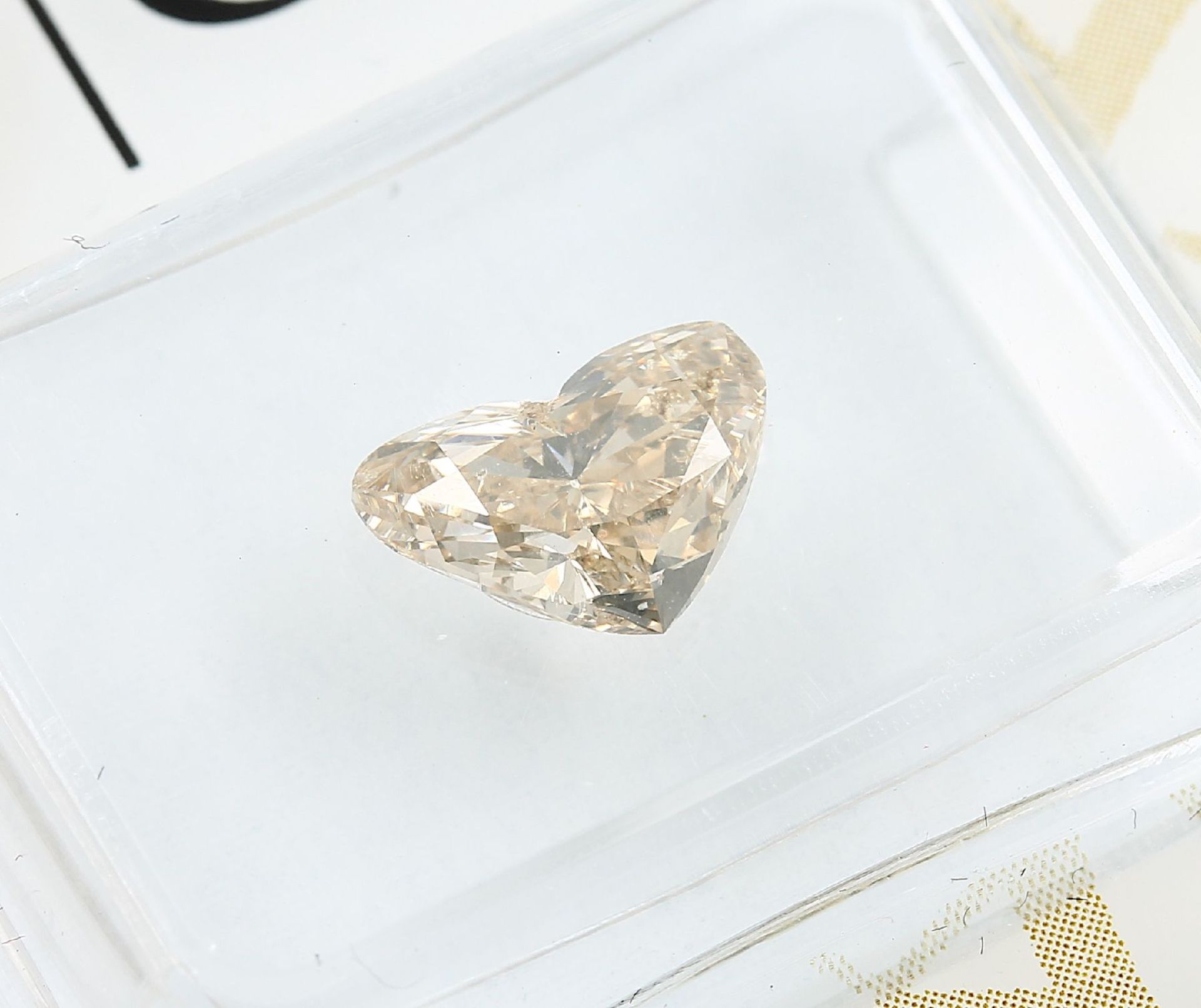 Sealed brilliant 1.03 ct , Natural, Fancy Yellow-Brown, GIA expertise Valuation Price: 2450, - - Bild 2 aus 4