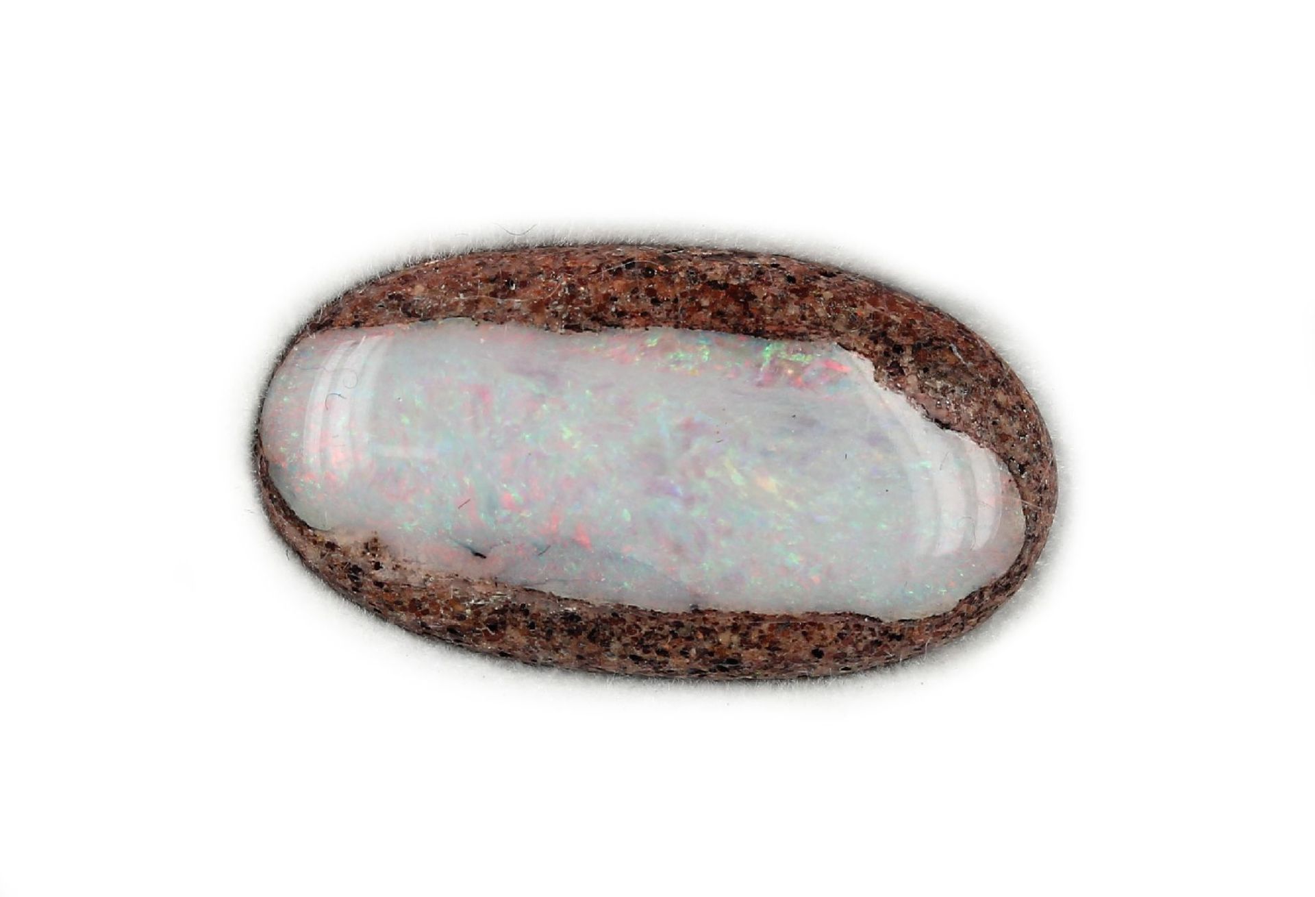 Loose boulder opal approx. 6.73 ct , play ofcolours in red, yellow and greenLoser Boulderopal ca.