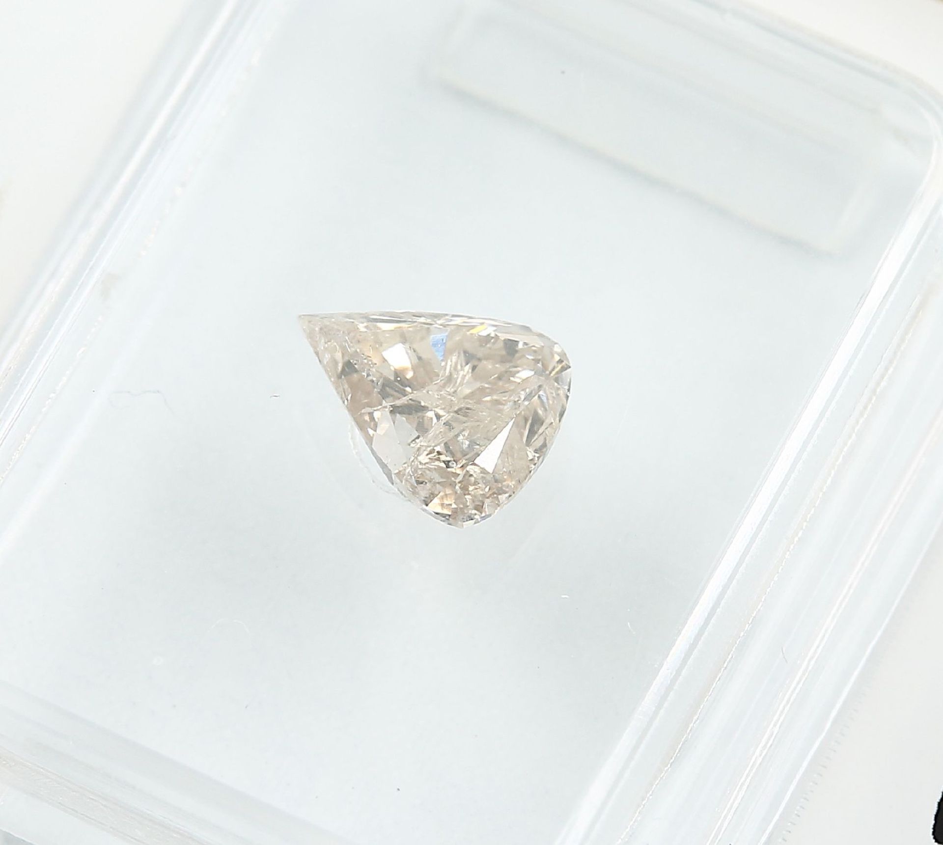 Sealed diamond-pear 0.70 ct, Natural, Fancy Light Yellow-Brown, GIA expertise Valuation Price: 1610, - Bild 3 aus 4