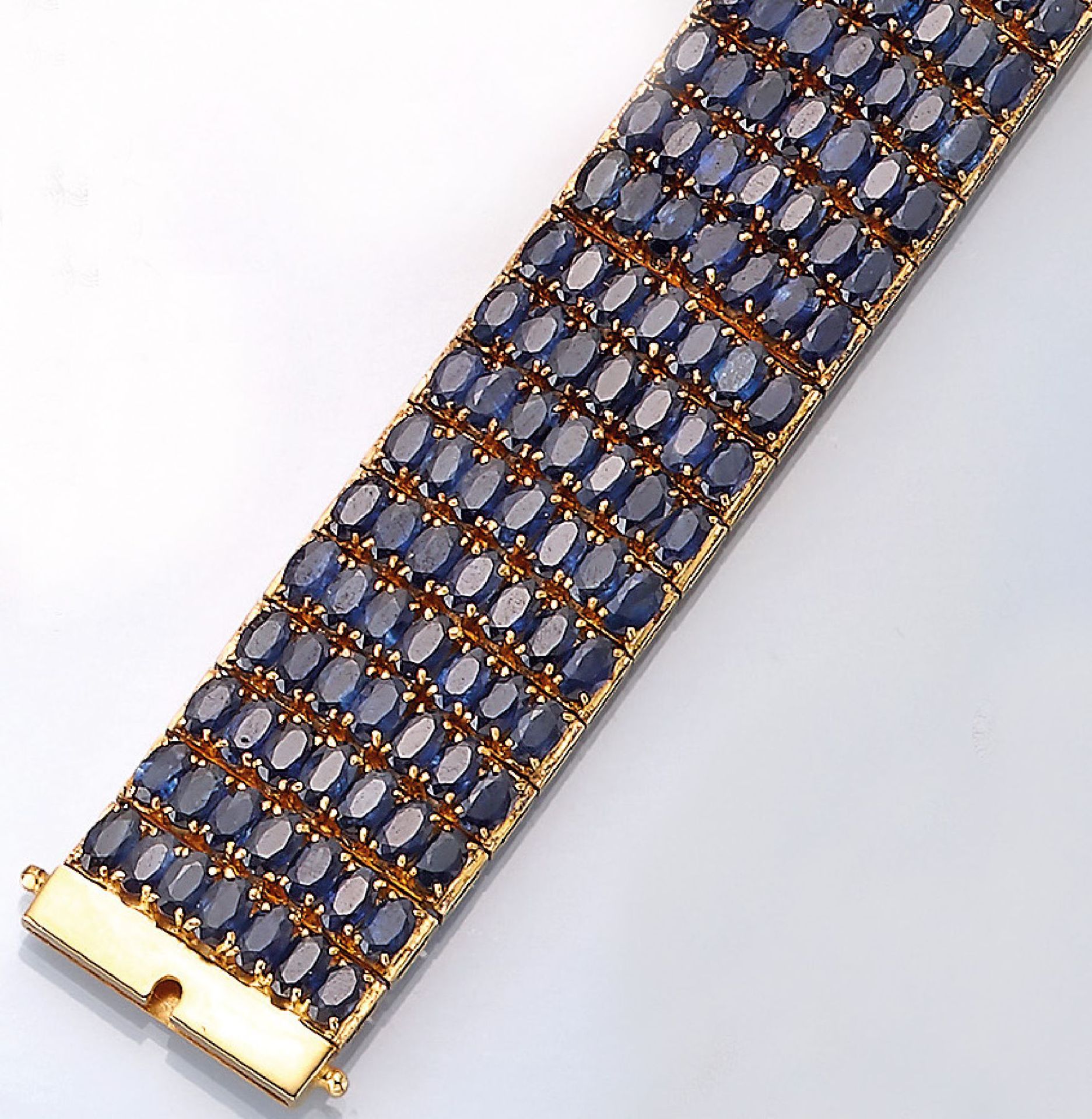 14 kt gold bracelet with sapphires , YG 585/000, approx. 1950/60s, 217 oval bevelled sapphires total