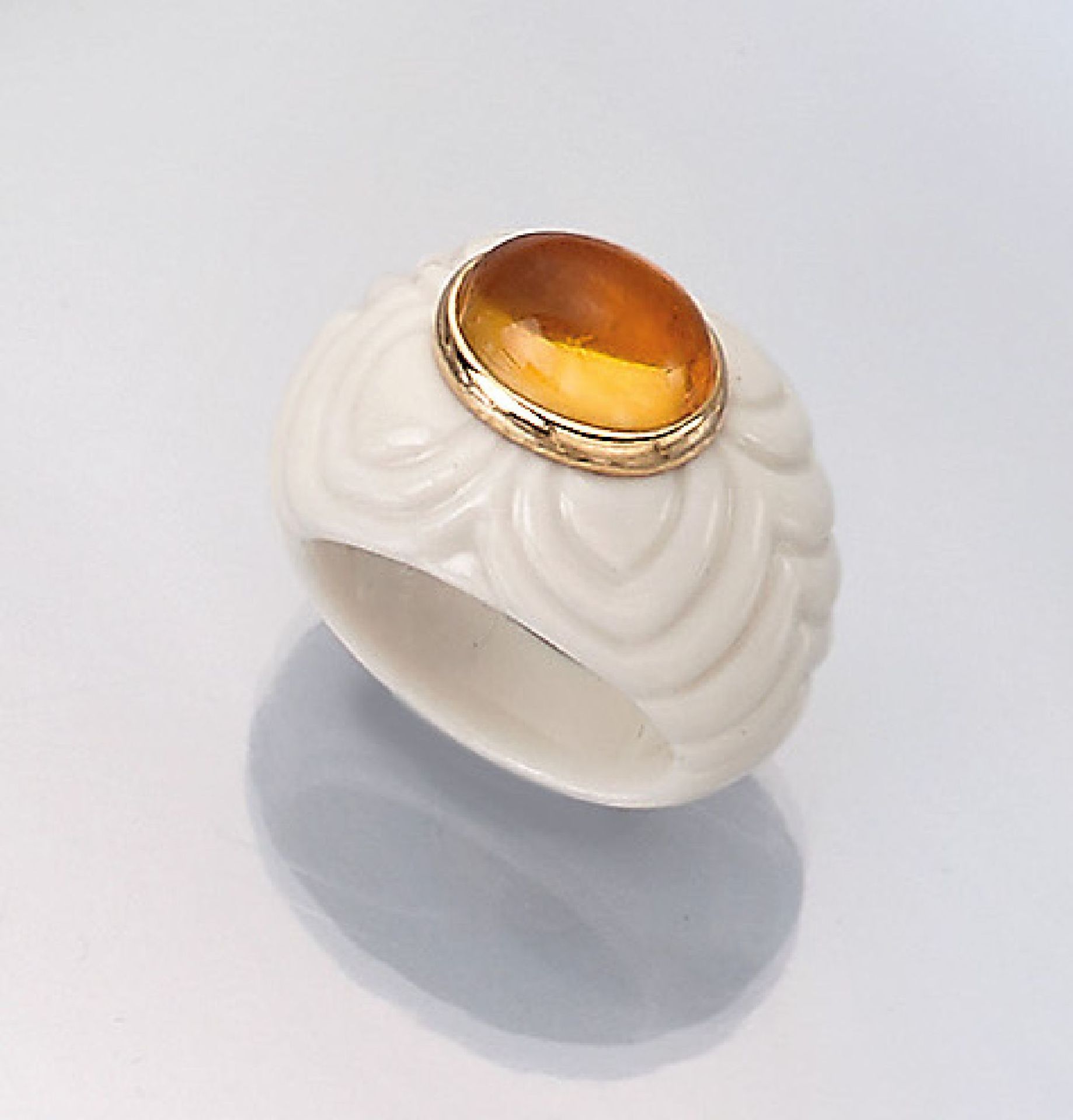 BULGARI ring with citrine , white ceramic with floral engraving, centered oval citrine cabochon