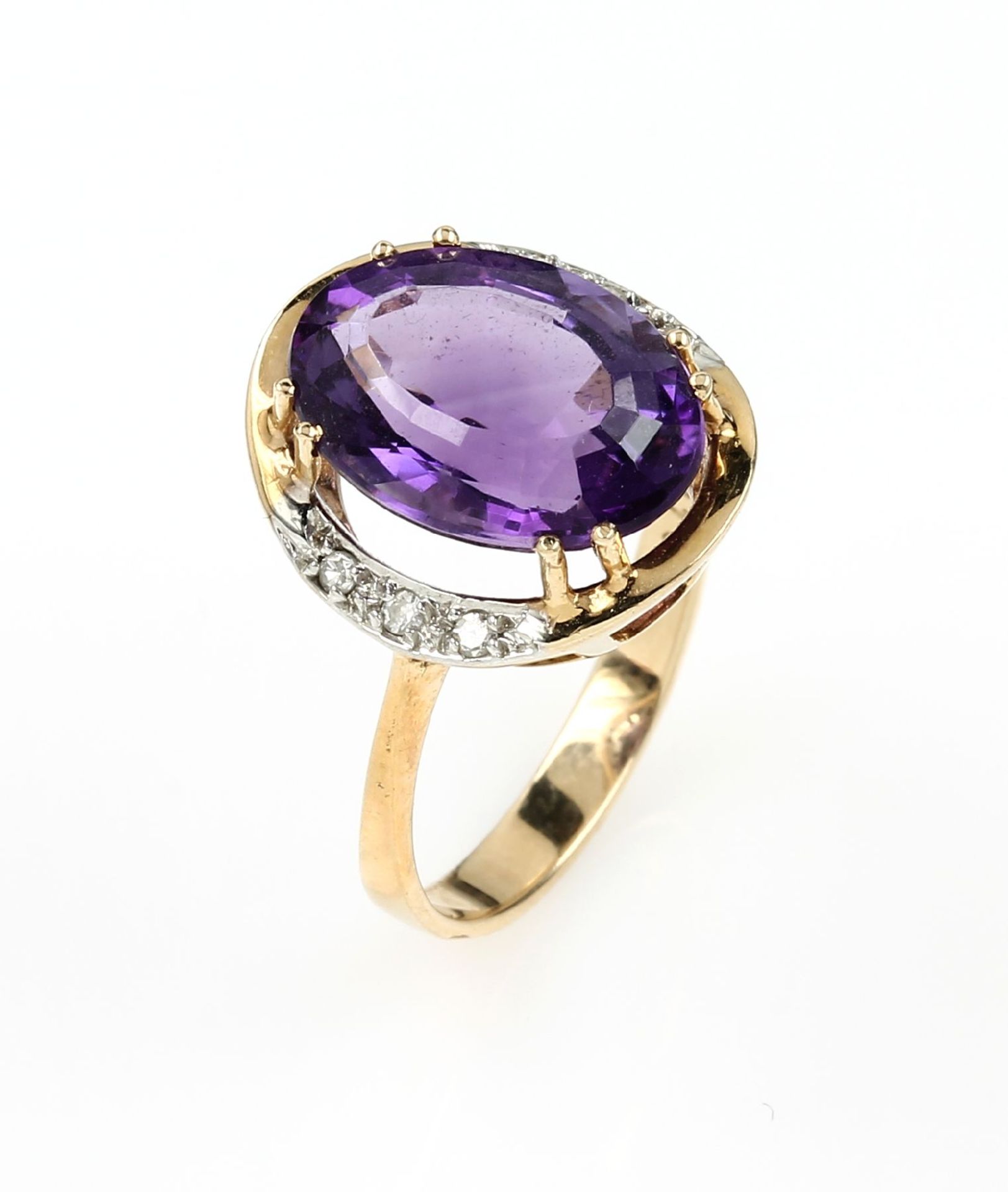 14 kt gold ring with amethyst and diamonds ,YG/WG 585/000, centered oval bevelled amethystapprox.