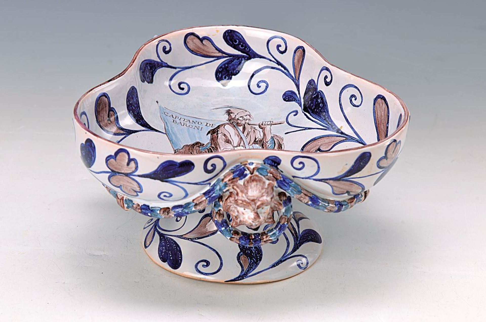 fancy faience bowl, Galle, around 1895, signedGalle Nancy, triangle form with lion heads