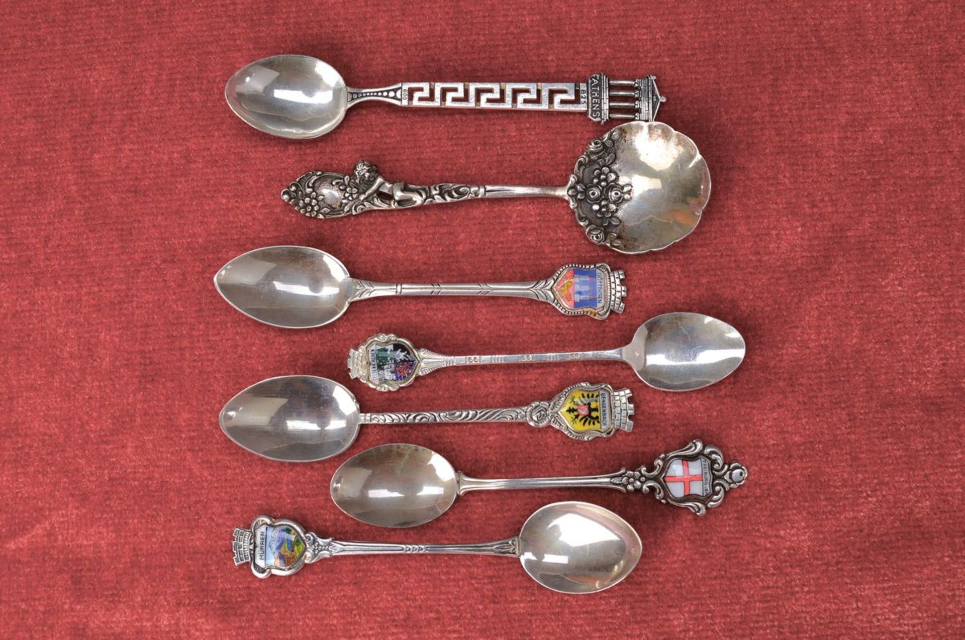 large convolute of Souvenir spoons, 20th c., 7of silver: Mürren, Göttingen, Gelsenkirchen,