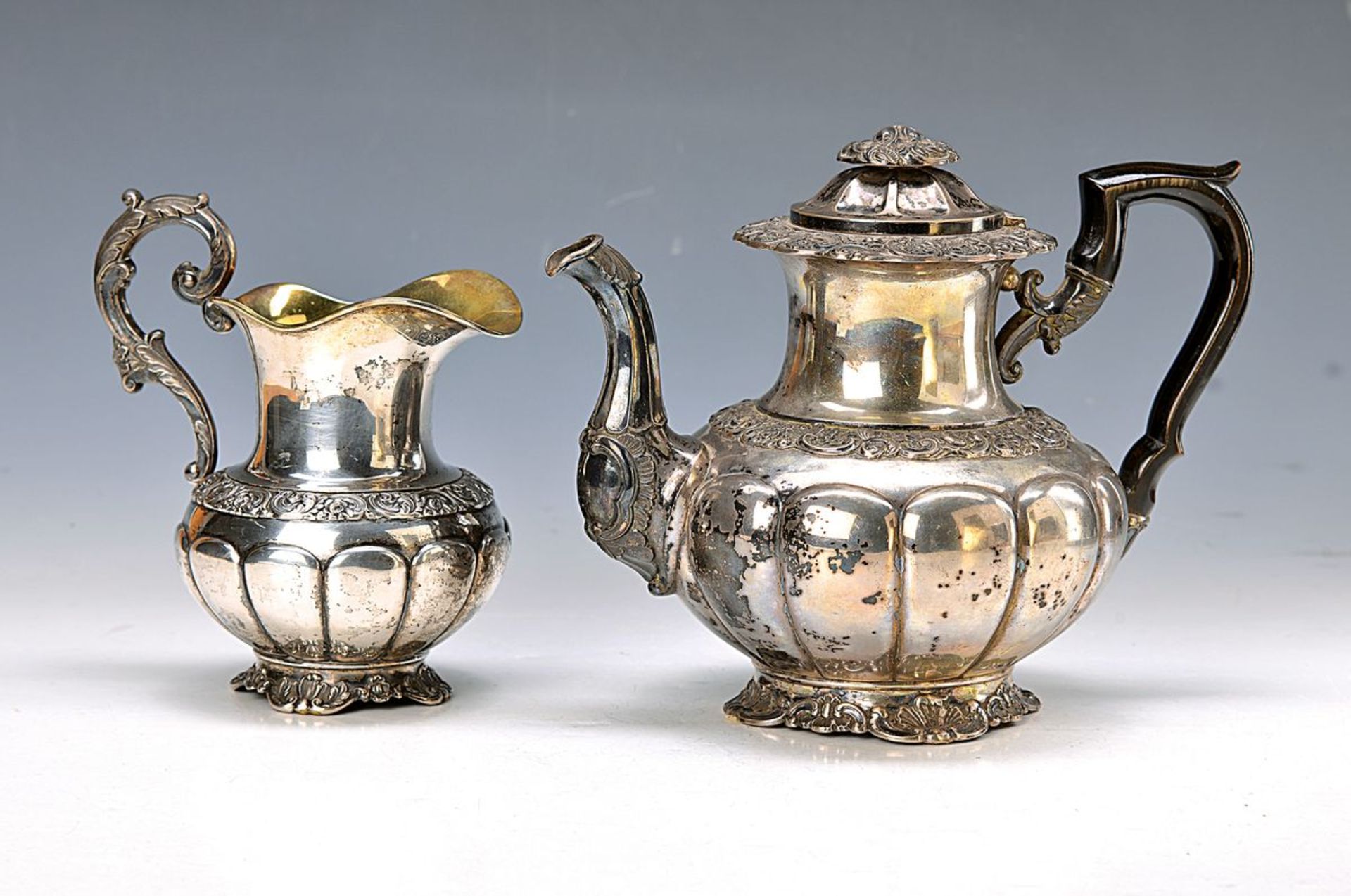 tea pot, German, Middle of 19th c., 13 lot silver, marked Stadler, opulent embossed with rococo