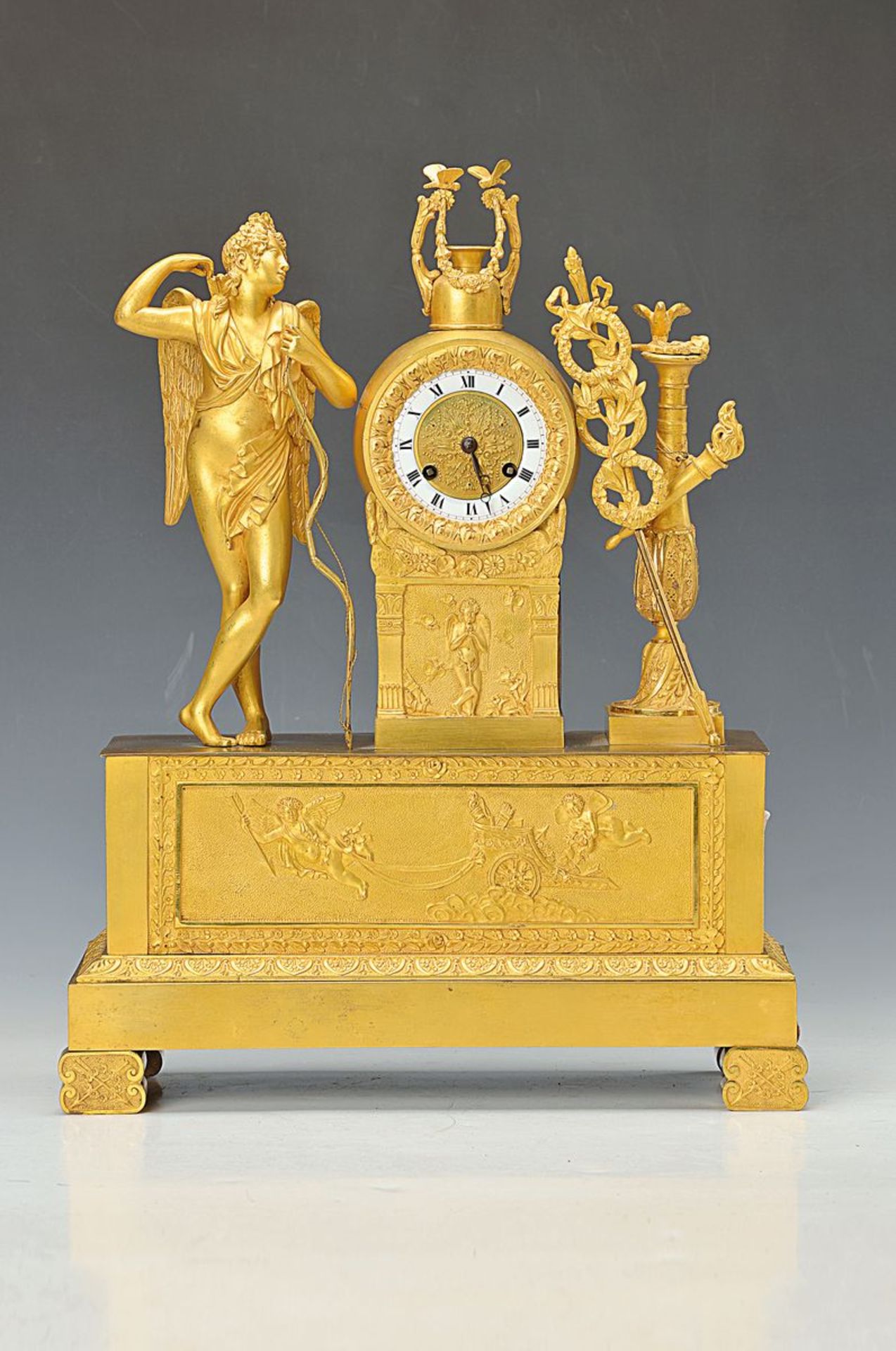 Pendulum, France, around 1830, opulent decorated and gilt bronze housing, in pedestal with wagon