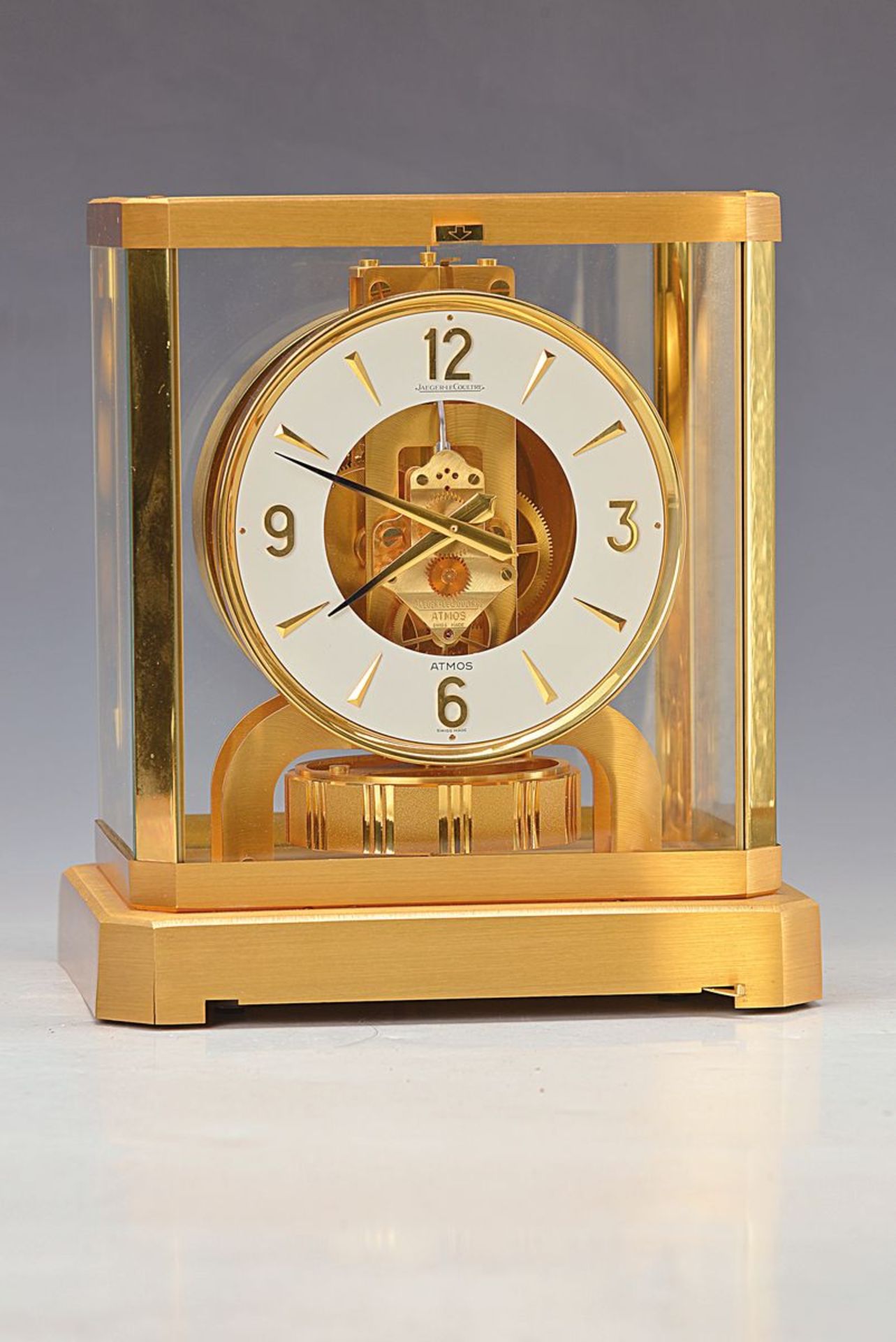 table clock Atmos, Jaeger-LeCoultre, with matching wall bracket, Switzerland, 1972/88 , gilt brass