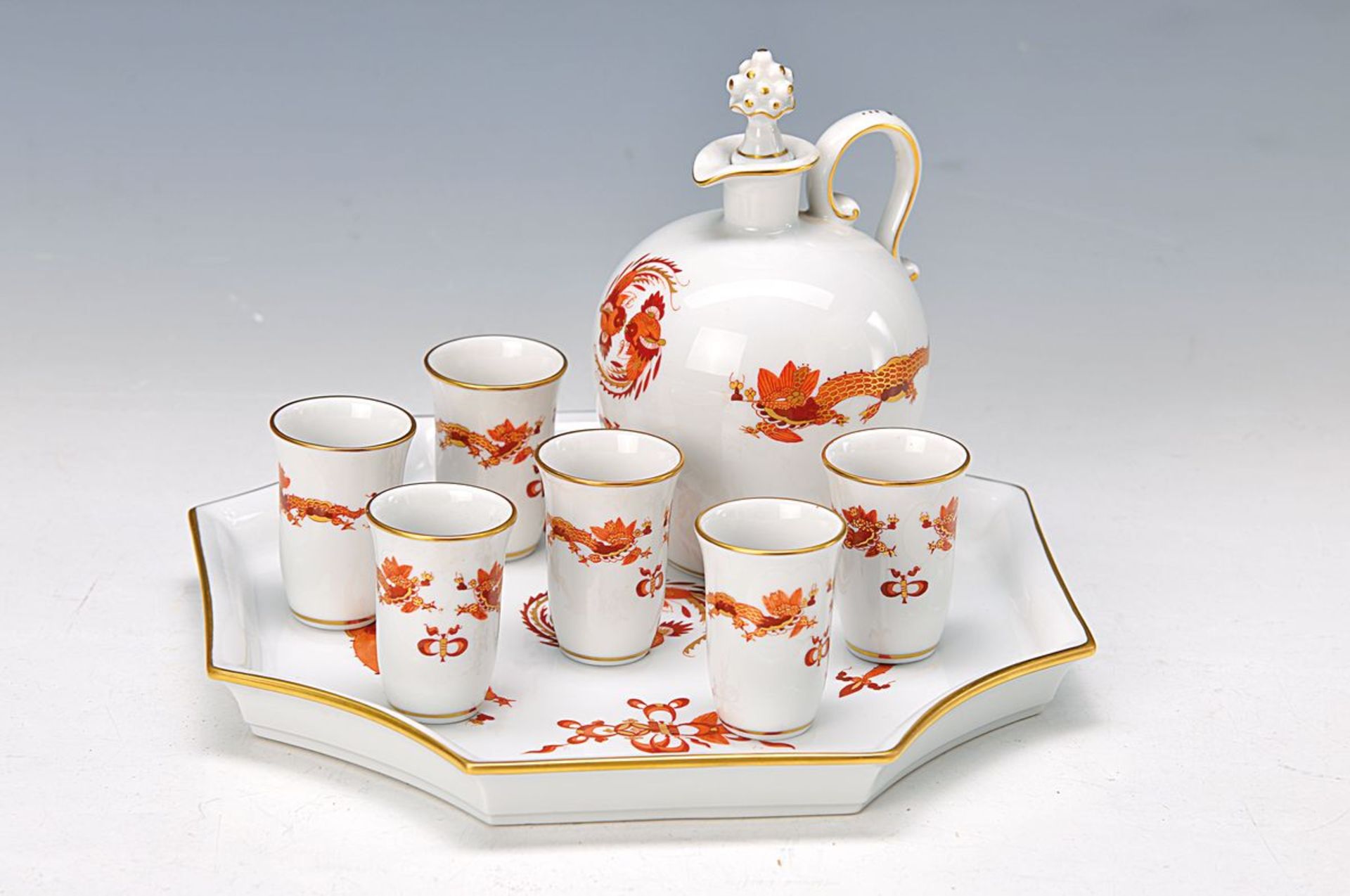 Liquor service, Meissen, 1960s, red dragon decor gold heightened, tray, carafe and six small
