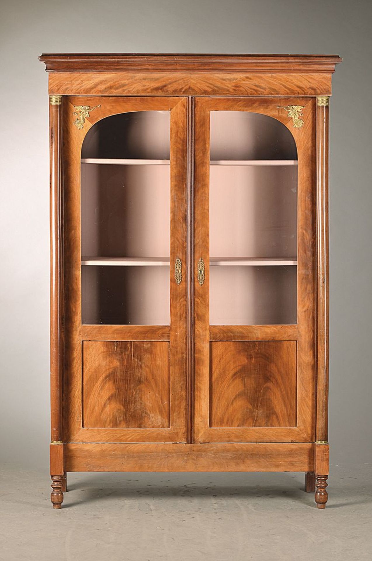 showcase, France, around 1900, Empire style, mahogany veneer with metal applications, two fully