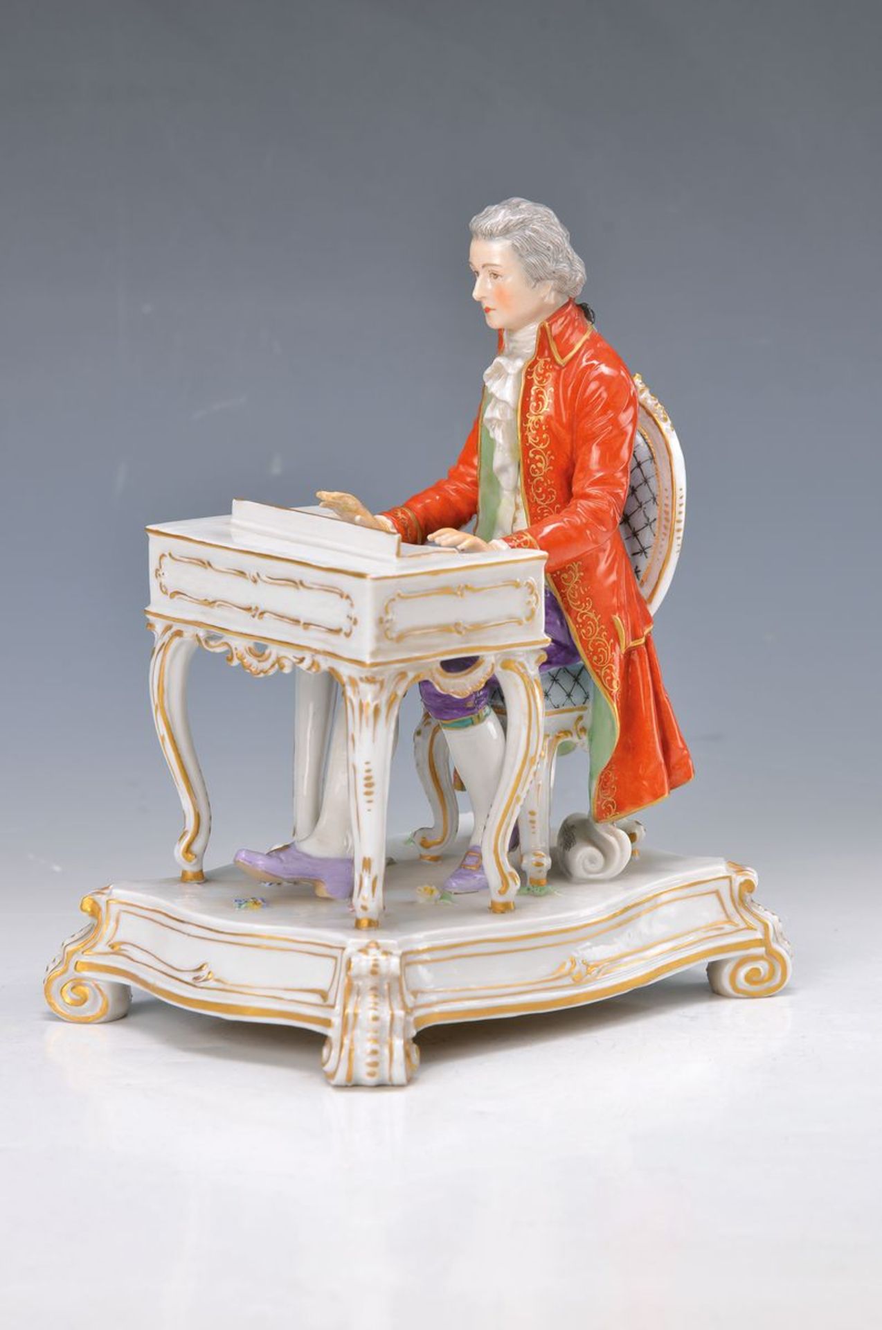 figurine, Passau, around 1900, Mozart on Spinet, painted in bright colors, hands rest.,H. approx.