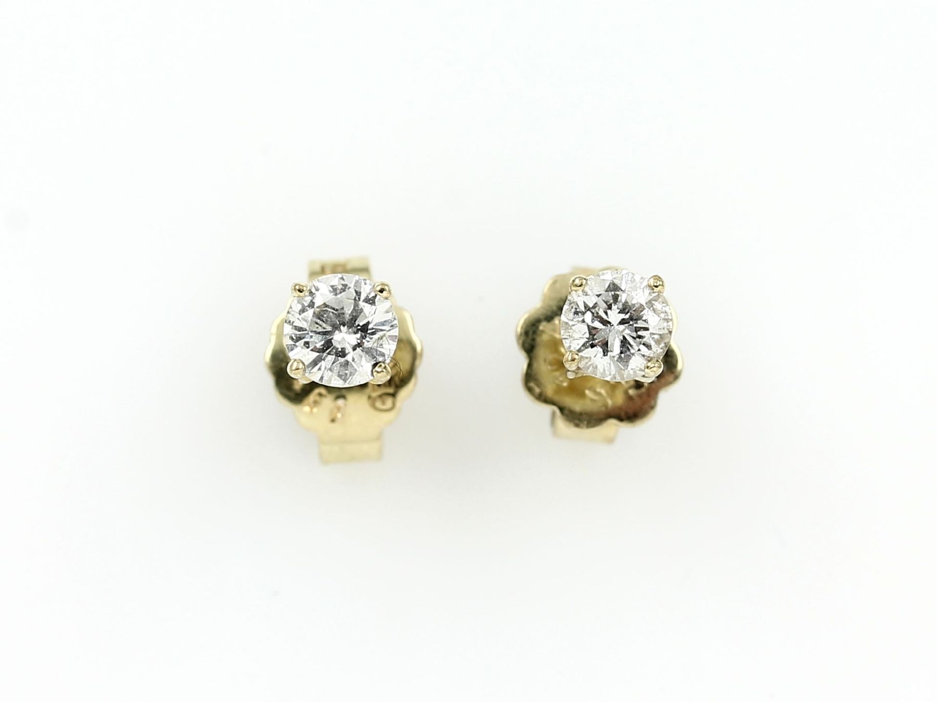 Paar 14 kt Gold Ohrstecker mit Brillanten, GG 585/000, 2 Brillanten zus. 0.40 ct Weiß/si-p1Pair of