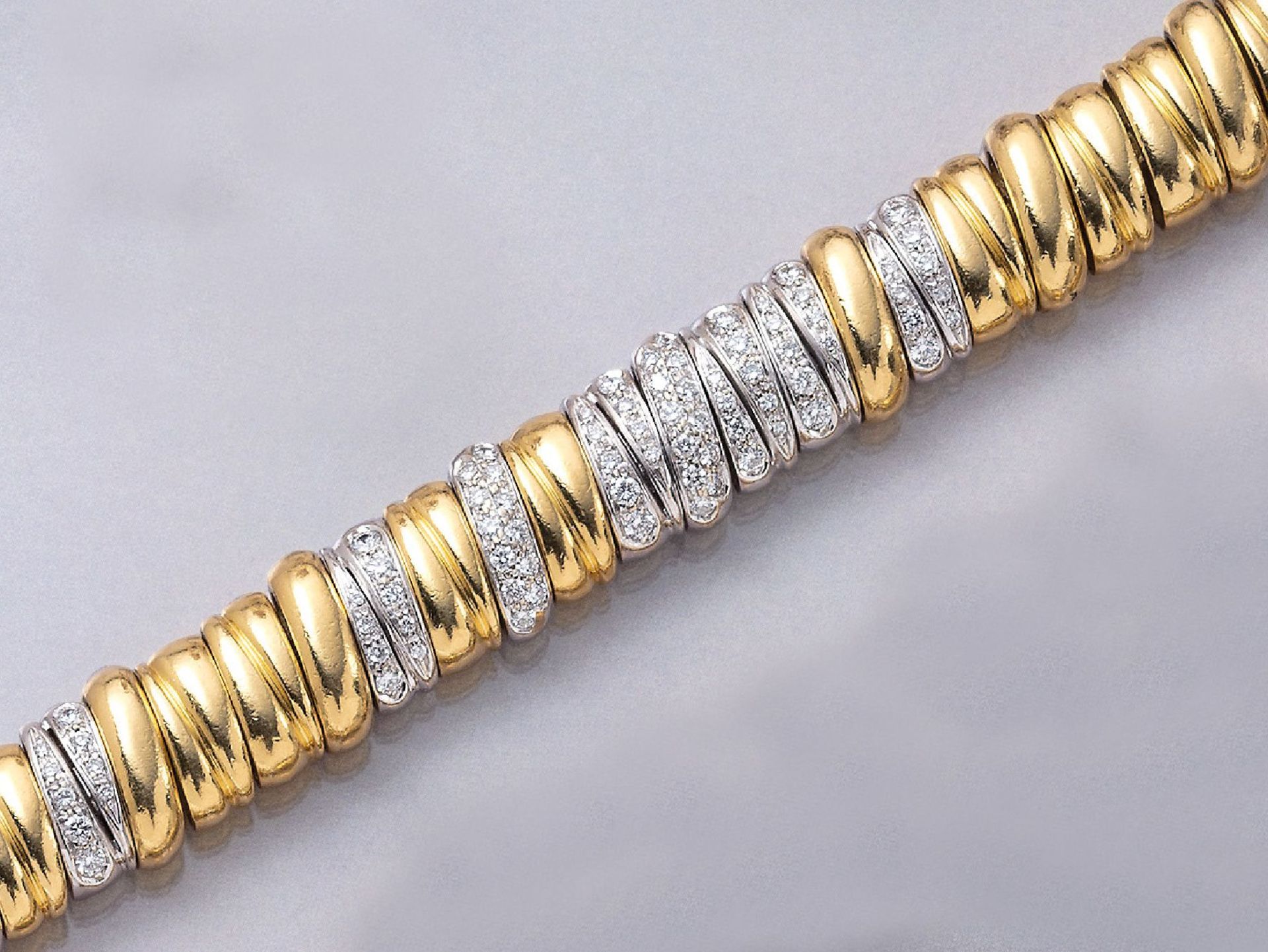18 kt Gold POMELLATO Armband mit Brillanten, GG/WG 750/000, in WG gefasste Brillanten zus. ca. 3.0