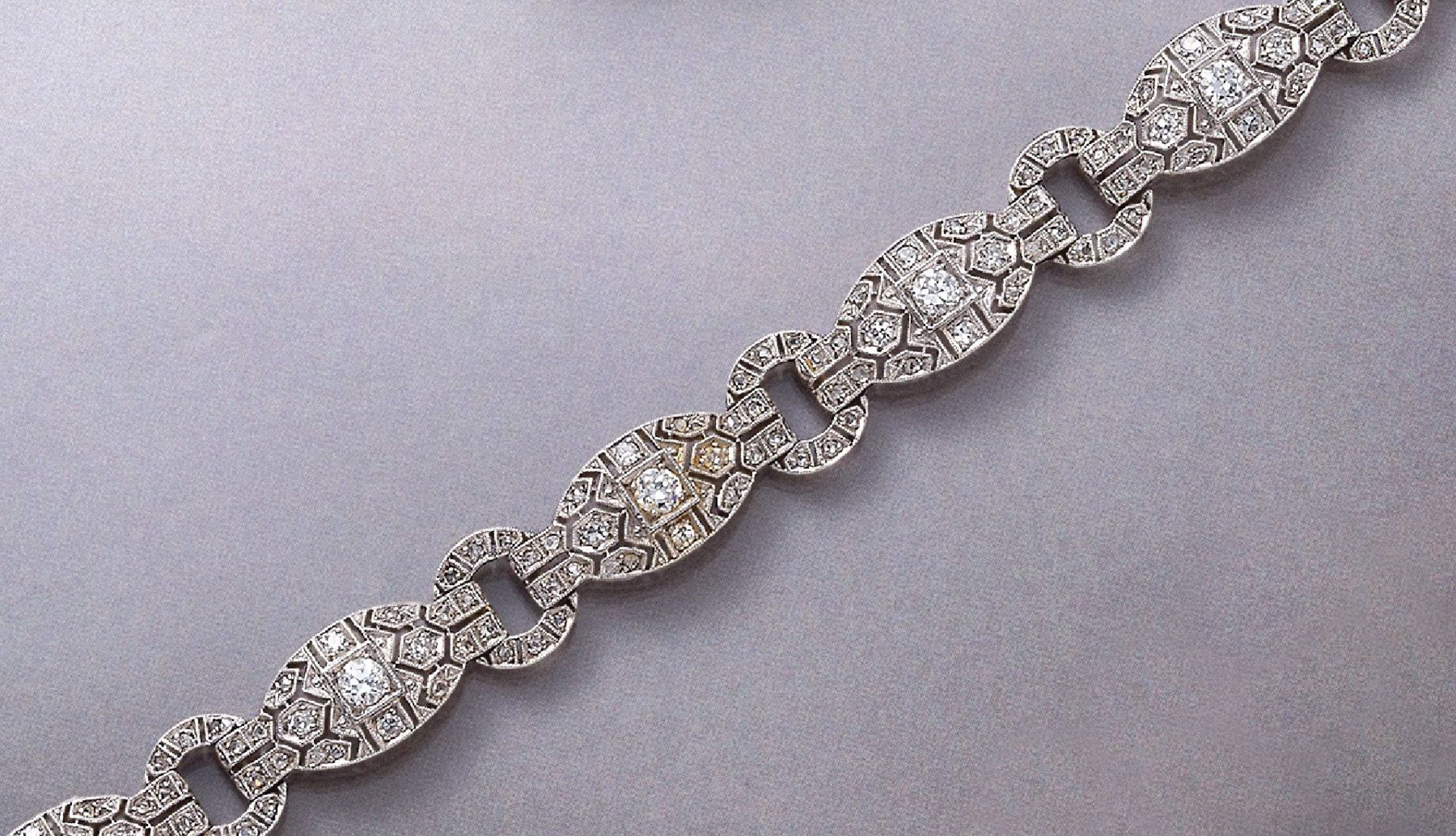 Art-Deco Armband mit Diamanten, WG 750/000, um1920, bewegl. Glieder bes. mit Altschliff- diamanten