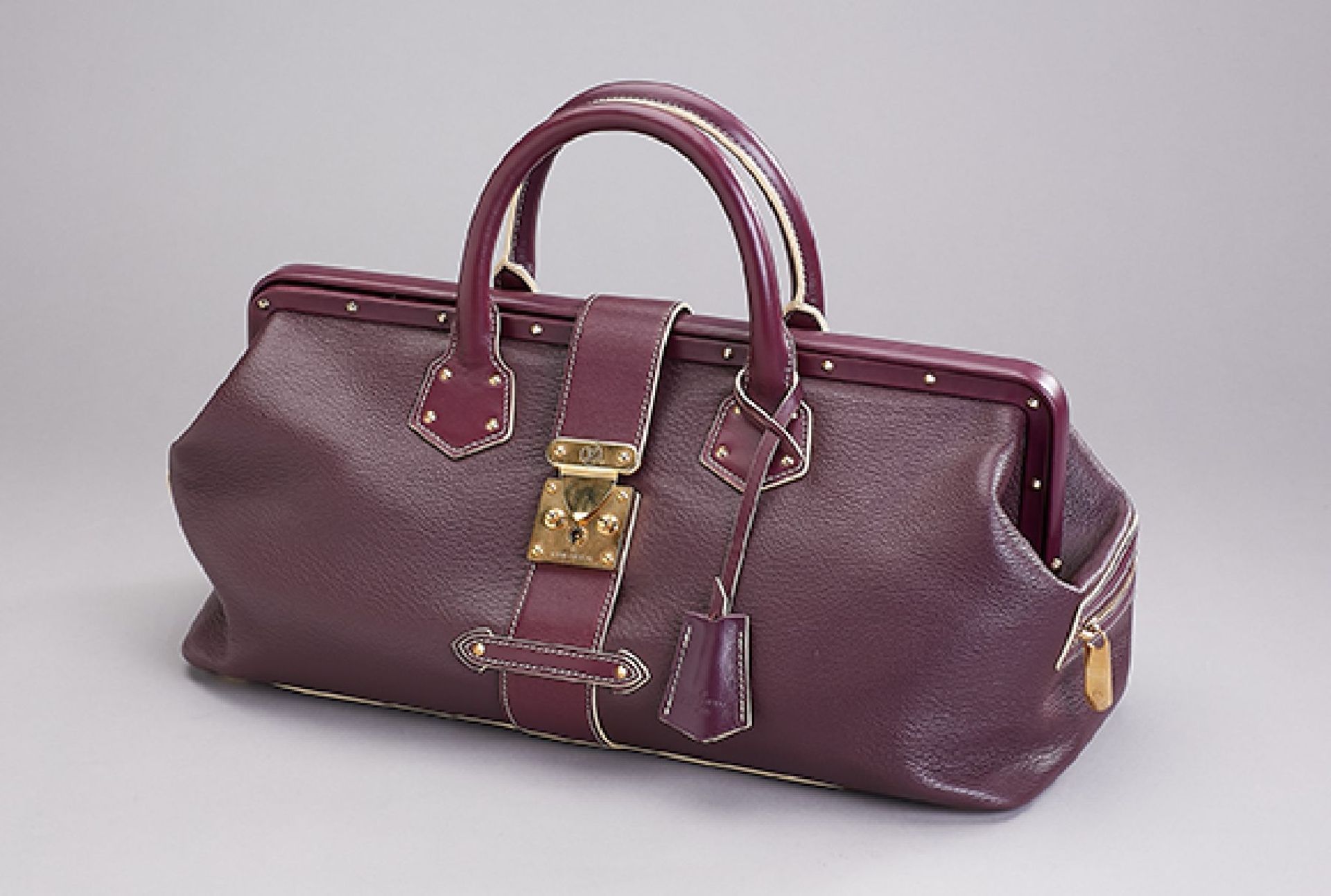 LOUIS VUITTON Handtasche L'Ingenieux, Grand Modell, pflaumenfarbenes Leder, goldfarb. Beschläge,
