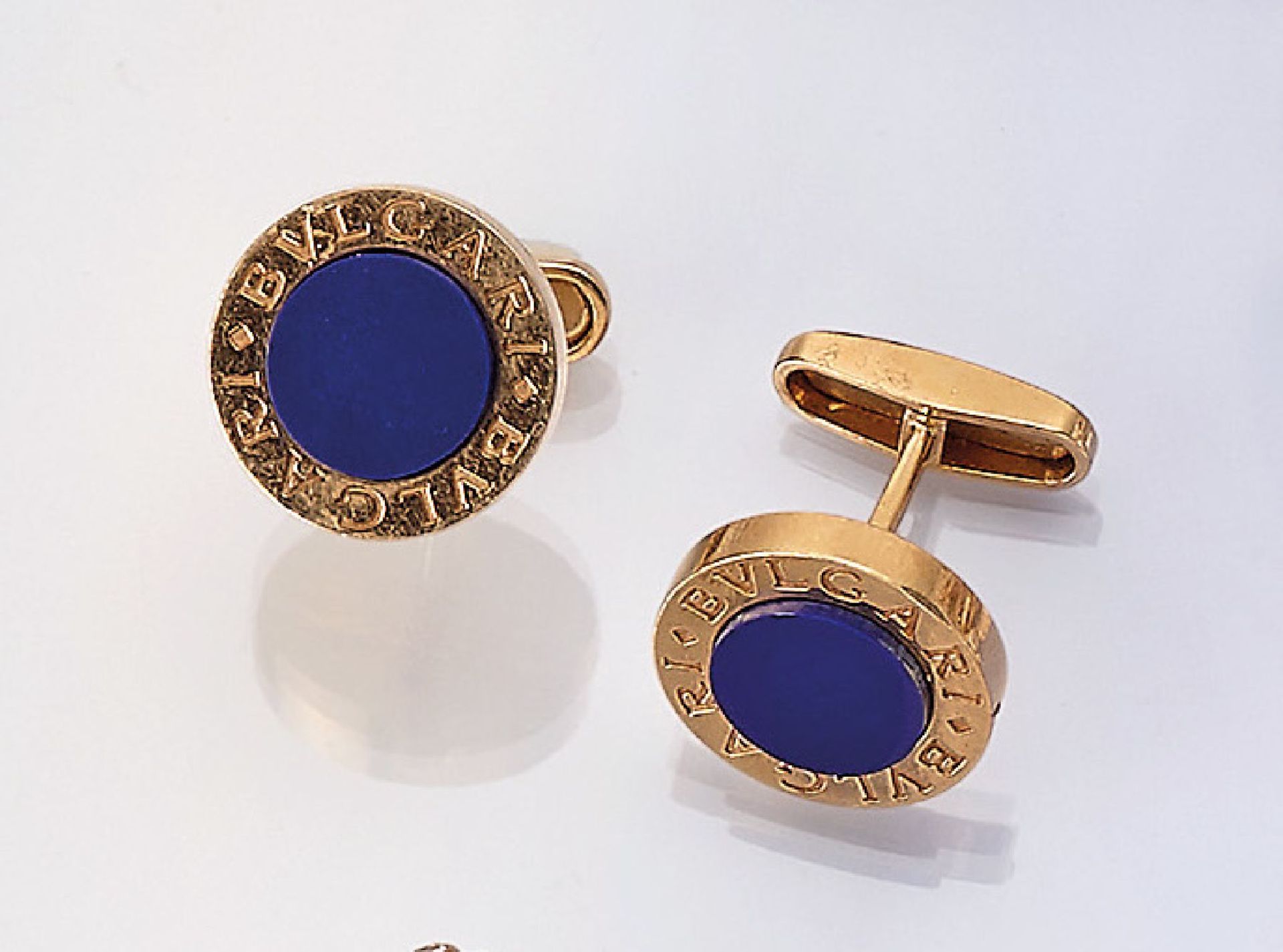 Paar 18 kt Gold BULGARI Manschettenknöpfe mit Lapislazuli, GG 750/000, mittig mit eingelegtem