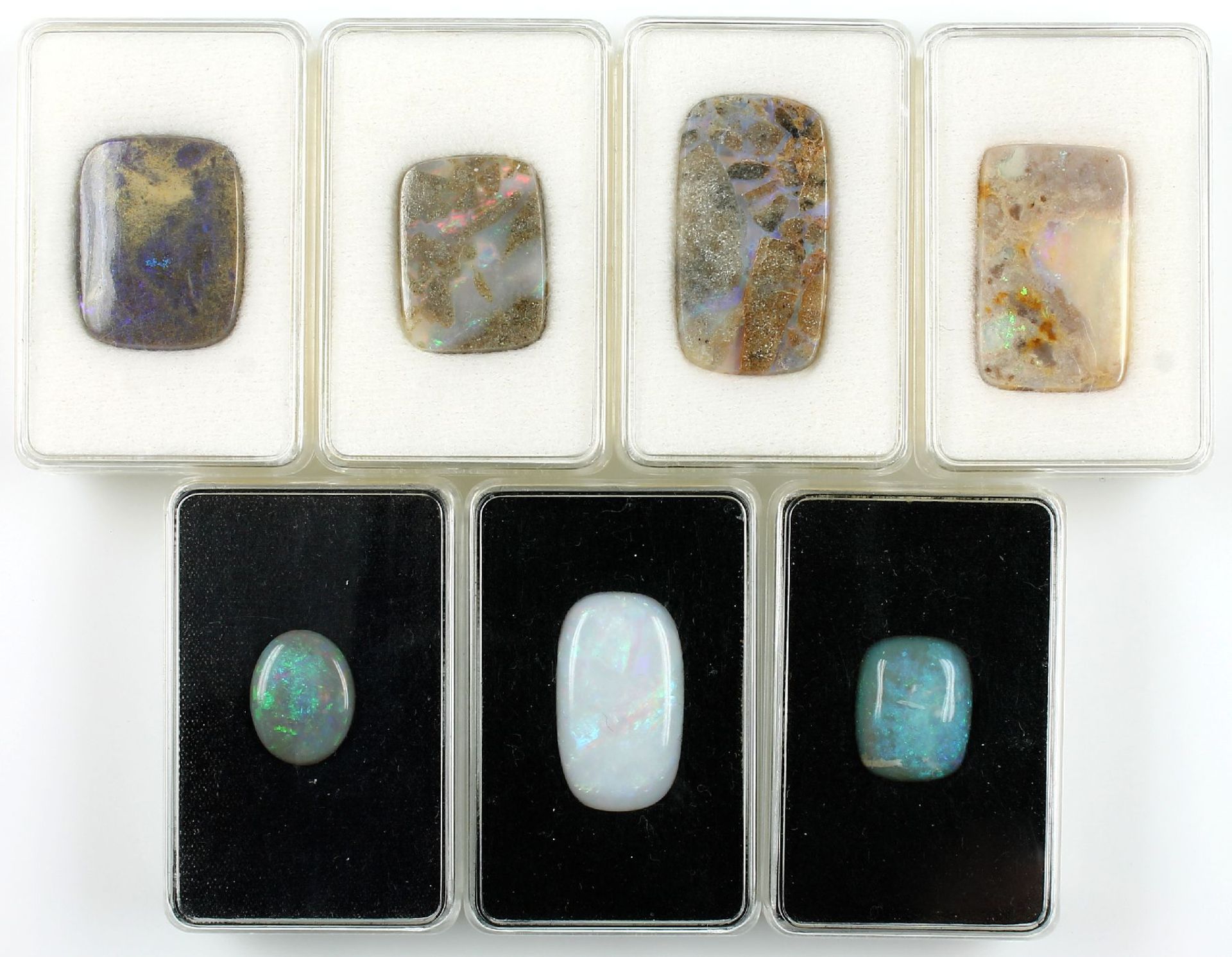 Lot 7 lose Opale, best. aus: 1 x ca. 15.4 ct, rechteckiger Cabochon, ca. 16 x 27 mm, Farbspiel in