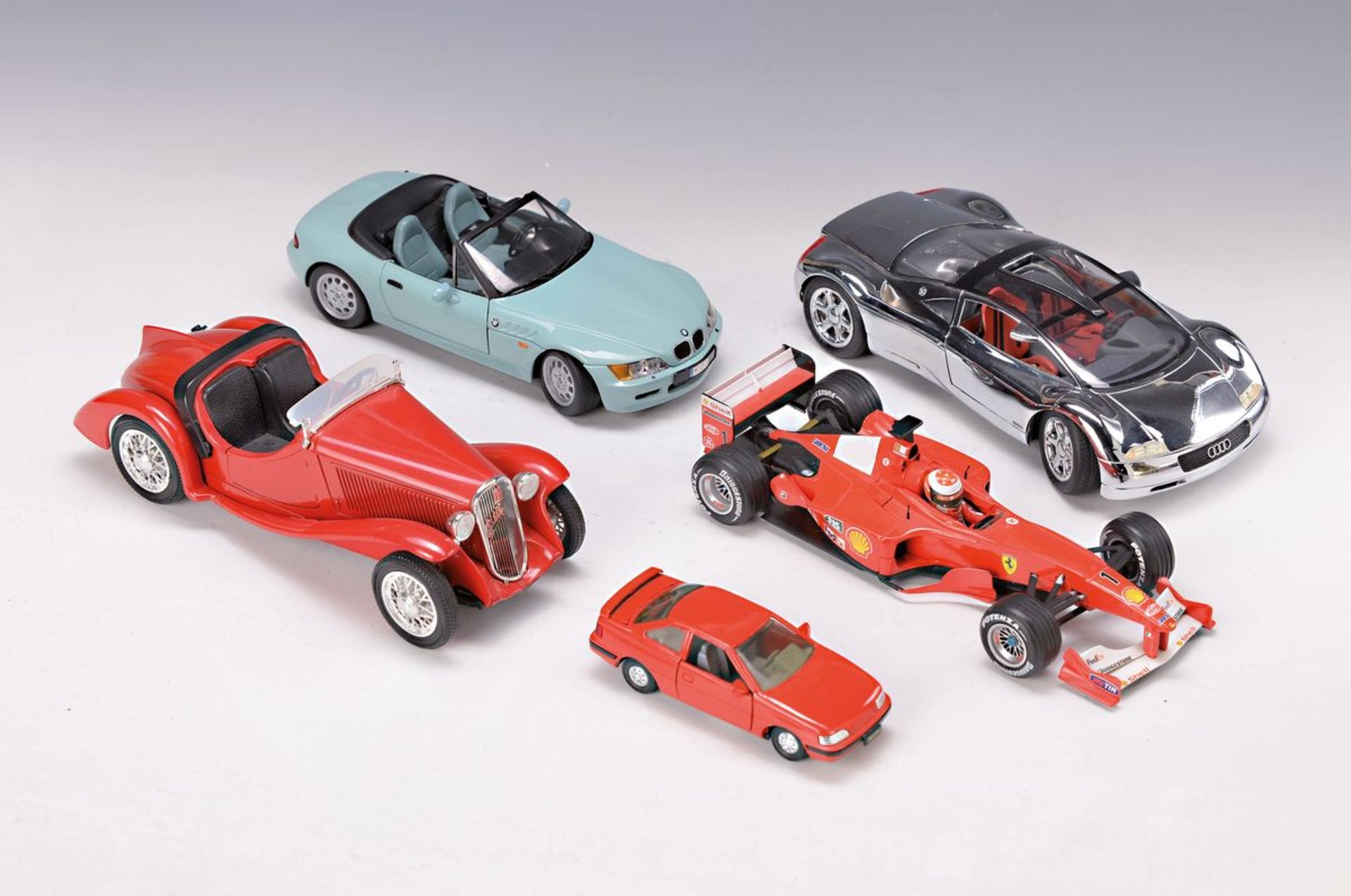 Konvolut aus 5 Modellautos, 20. Jh., versch. Marken: Polistil, UT Models, Hotwheels (Ferrari),