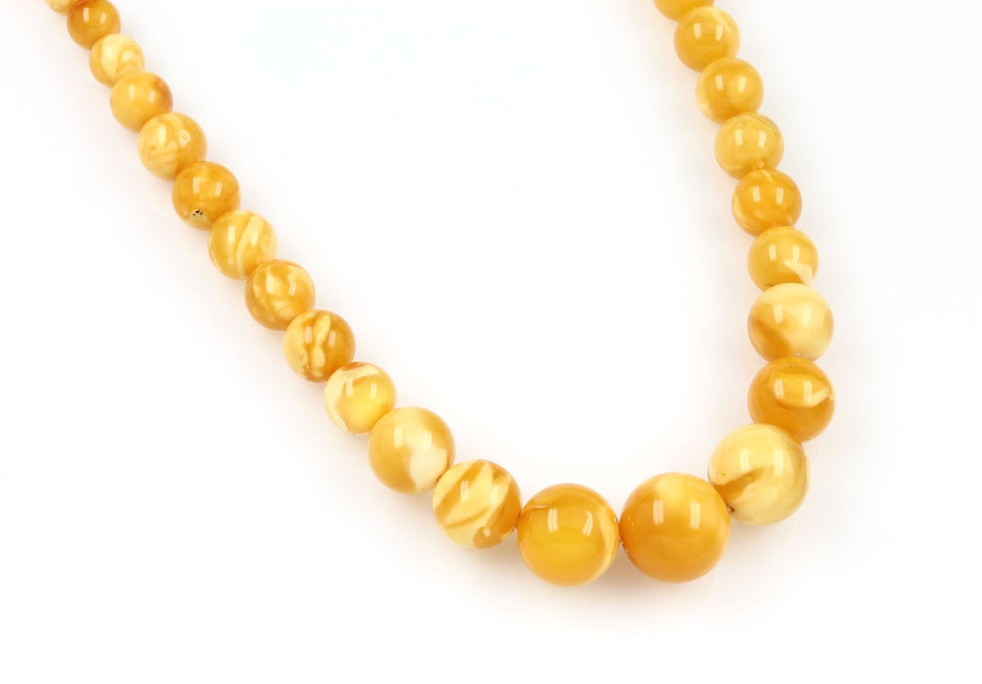 Collier aus Butterscotch-Bernstein, Bernsteinkugeln ca. 8 - 15 mm, L. ca. 43 cm,