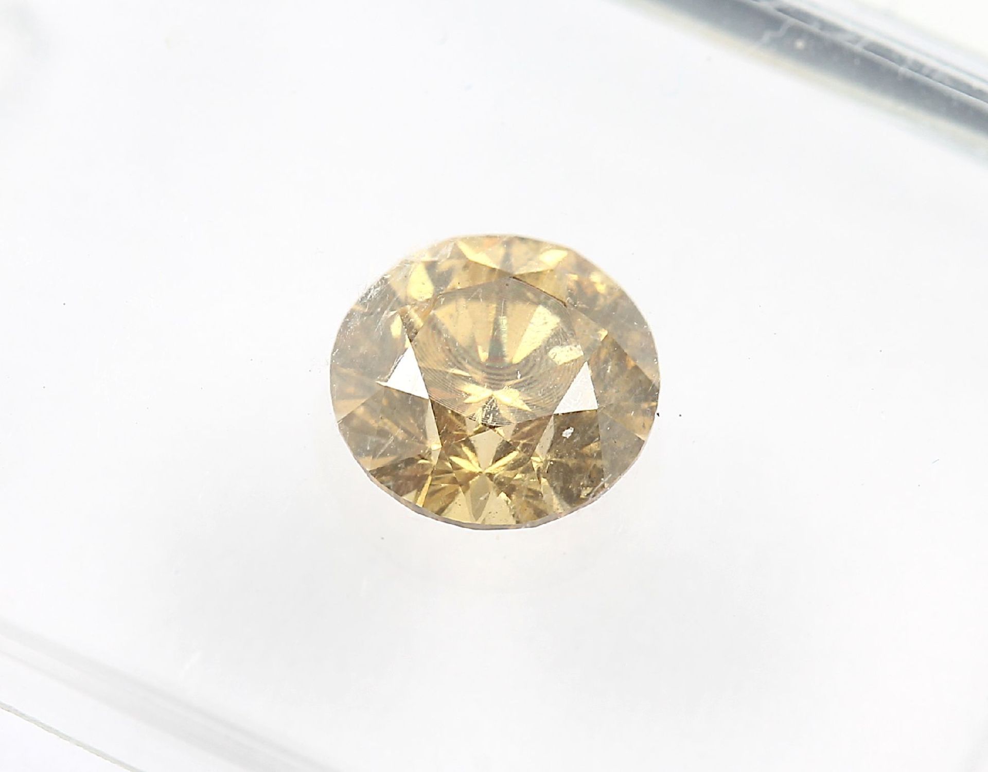 Loser Brillant, 0.51 ct natural fancy deep orangy yellow/p1, verschweißt, mit IGI- Expertise - Bild 3 aus 3