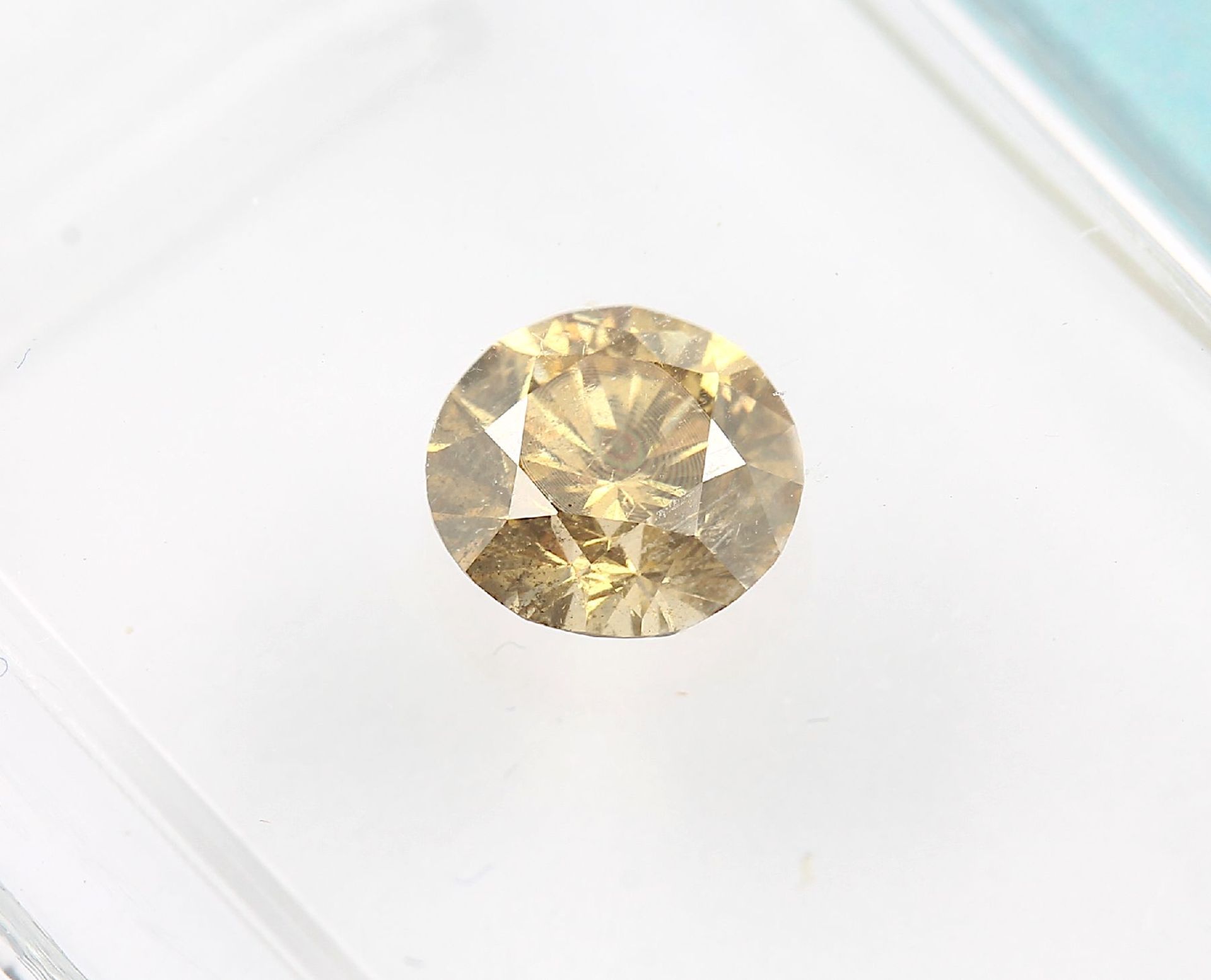 Loser Brillant, 0.51 ct natural fancy deep orangy yellow/p1, verschweißt, mit IGI- Expertise - Bild 2 aus 3