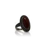 WHITE METAL AND RED STONE DRESS RING