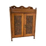 EDWARDIAN CARVED OAK SMOKERS CABINET