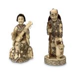 PAIR OF CARVED CHINESE FIGURES