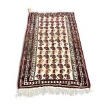 PERSIAN RED AND CREAM RUG