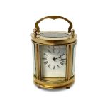 19TH CENTURY OVAL CASED MINIATURE CARRIAGE CLOCK